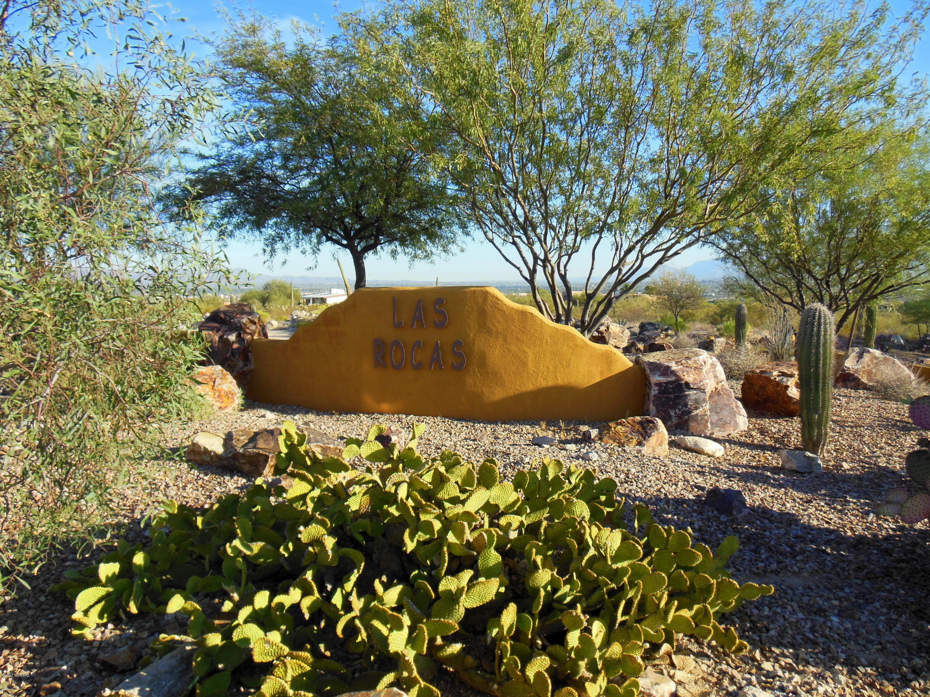 Absolutely beautiful gated community to build your dream house! Environmentally sensitive community with only 20 lots from  1.11 acres to 2.01 acres and 31.93 acres of common area so it seems like you have more land around you. Utilities are at the property lines and ready to hook up, you need to install your own septic. Great mountain and sparkling city lights. No Manufactured Homes allowed and all homes built shall be over 2000+ square feet. Easy access and minutes to I-10 - downtown and yet very quiet and tranquil area. Get ready to build and enjoy your home.