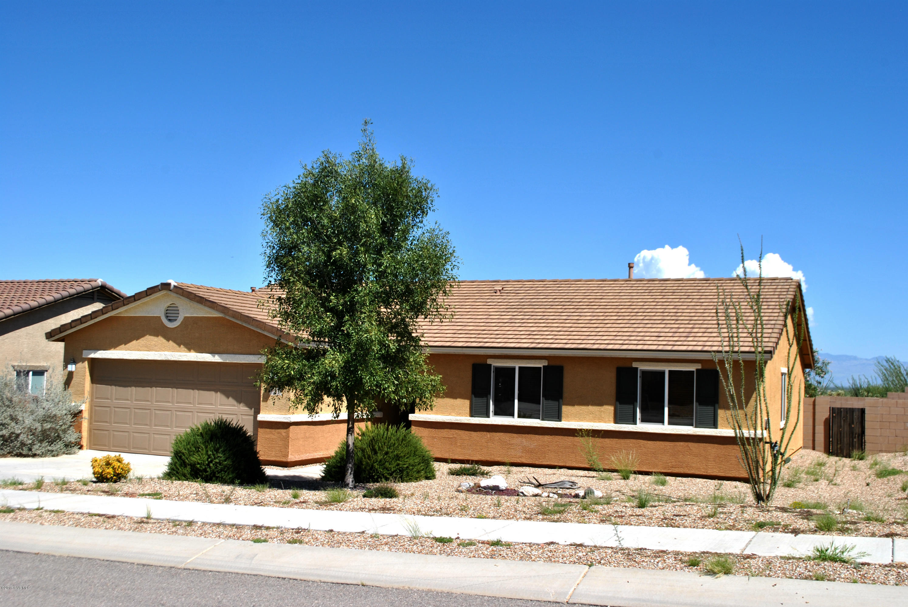 This ''move-in'' ready home features three bedrooms plus a den is located on a low traffic street. The conveinent plan of this home will suit your needs. This residence has a cement tile roof, central air conditioning and a private rear yard. View this home today and end your search today.