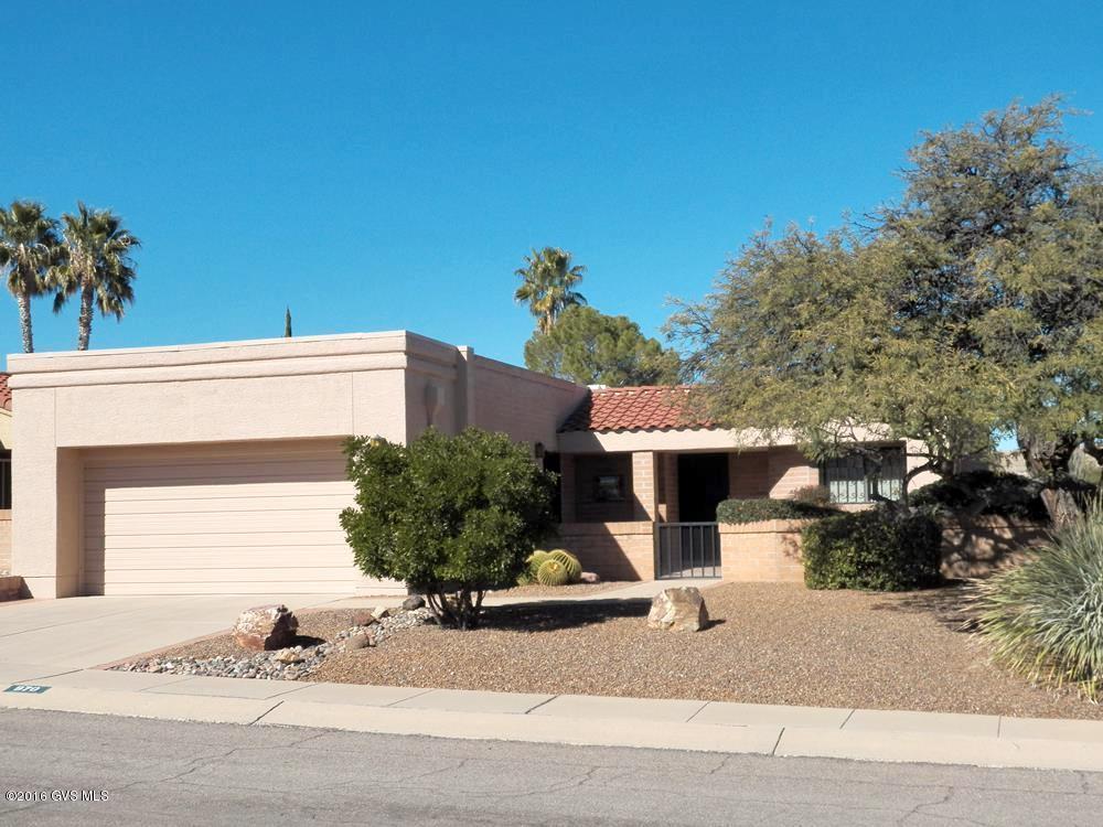 A majestic mesquite tree and front courtyard distinguish this home as you approach. The neat, clean exterior is indicative of the regular maintenance undertaken by the original owner since its construction in 1985. Roof and termite warranties, HVAC service contract are automatic renewals. The great room features a 9ft ceiling, abundant natural light and gas log fireplace. A breakfast bar separates the kitchen from the dining/living area. A 7ft x 20ft heated/cooled office/hobby room is the real bonus to this 2BR 2BA home. Currently not a member of Green Valley Recreation although it can be added. Community clubhouse/pool/spa are available for residents of this subdivision, included in the $300 annual HOA dues.