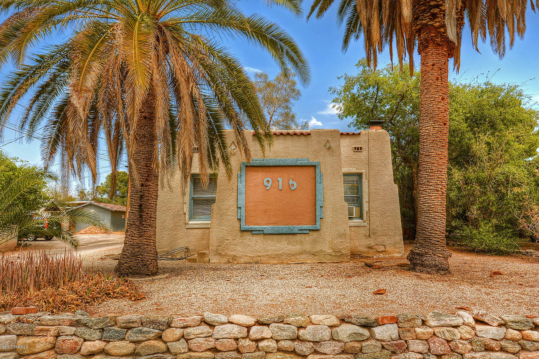 Sam Hughes home ready for your vision...Great location...Walking distance to the U of A. Modern Street car, Himmel park and more! just 1 block from the U of A.  2 bedroom 1 bathroom.  Living room with vaulted beamed ceilings. Separate workshop/ Laundry room. Off Street parking...Great opportunity!