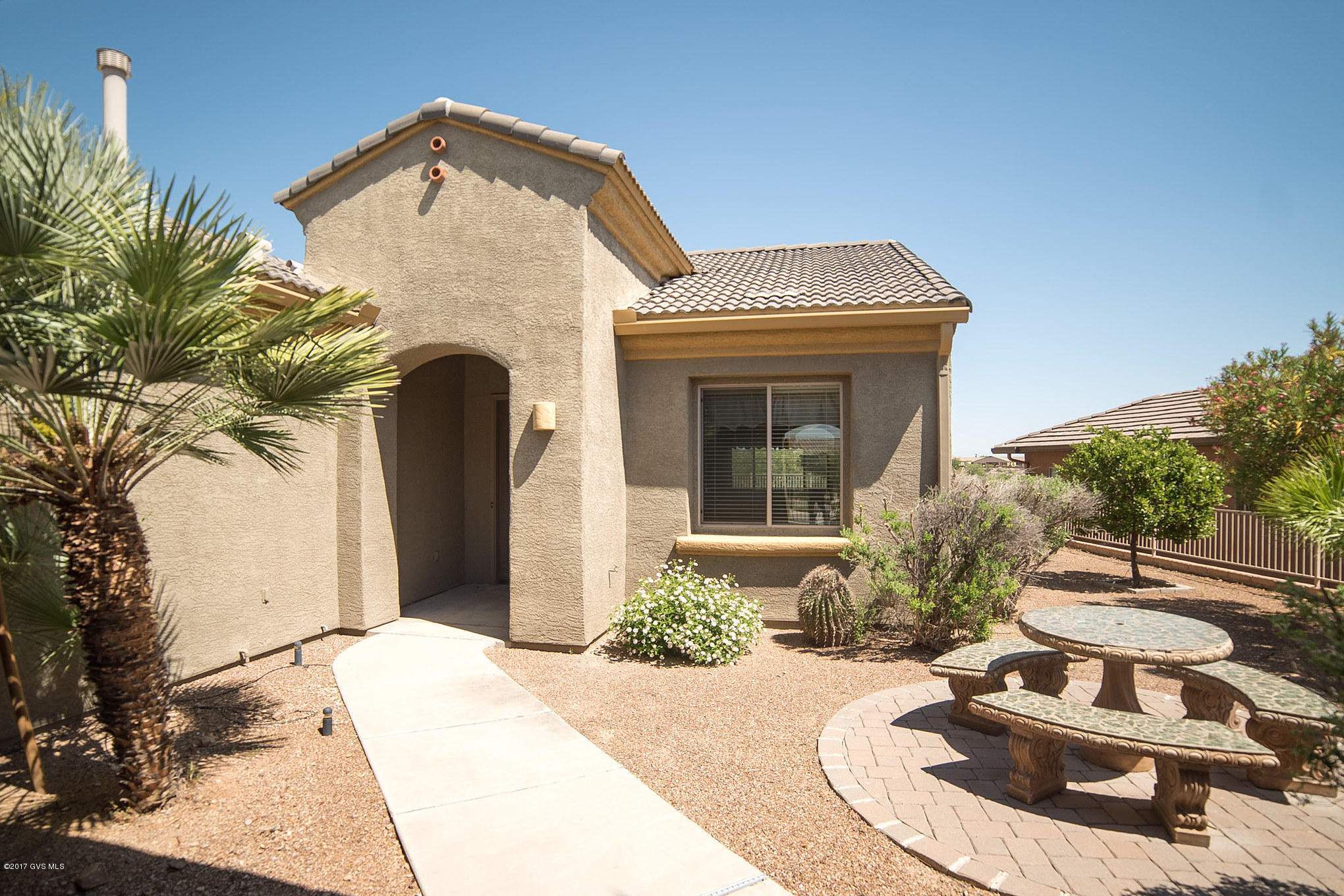 Lovely Bonita w/Casita is a blank slate waiting for the perfect Buyer to make it their own! Sitting high on a bluff overlooking the Canoa Ranch Golf Course it has sweeping mountain views in back and gorgeous mountain views from the courtyard as well. This home was built the way you want to live with a wide open floor plan. The large great room is open to the kitchen and has an open den that could be used as a formal dining room if so desired. There is a Casita with a full bath...a perfect space for a studio or guest quarters. A large covered patio in back offers a respite from the AZ sun, while you are enjoying the panoramic golf course & mountain views.