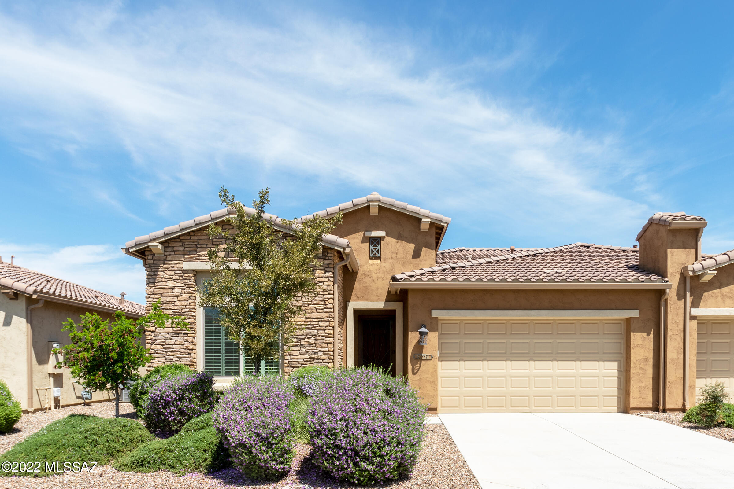 This is by far one of the most highly upgraded 1777 sq. ft. 2 Ensuite Bedrooms Den/Office, Lago Model Villa to come on the re-sale market. The general plan of the home includes 2 Bedrooms, 2 Baths; Great Room; Dining Area; Spacious Den; Grand Kitchen Island; Optional Powder Room; Generous Walk-in Closet in Master Suite; Master Bath 42'' x 60'' Shower w/Built-in Seat; Separate Laundry Room; 244 sq. ft. of Covered Outdoor Living Space; Deep 2-Car Garage; and 9'& 10' Ceiling Heights.  Upgrades to the home include ceramic ''plank'' flooring through-out the home; Wood Shutters on most all of the windows; Kitchen Counters, Sink, Cabinets, and appliances in the Kitchen; Custom Made Full Vanity in the Master Bathroom that replace the Linen Closet, Custom Lighting and Ceiling Fan Installed in Master Walk-In Closet; Instant hot water in Master Bath; All cabinets and drawers soft close; and Epoxied Garage Floors, pull-out drawers in kitchen cabinets; and much more! The location of the home is situated in that there is more space behind the home than most of the other Villas.