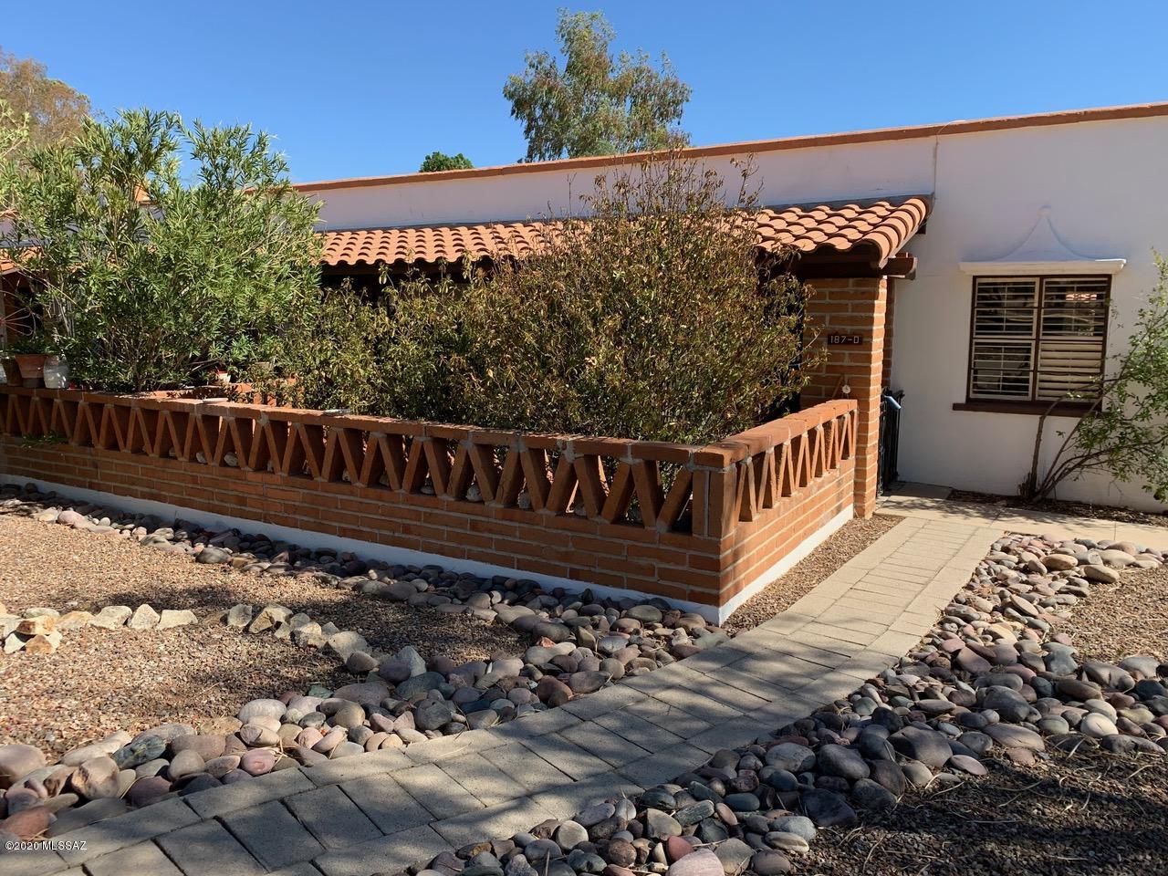 Offers storage shed on the back with washer and dryer.  Tiled throughout. Unfurnished, needs TLC.