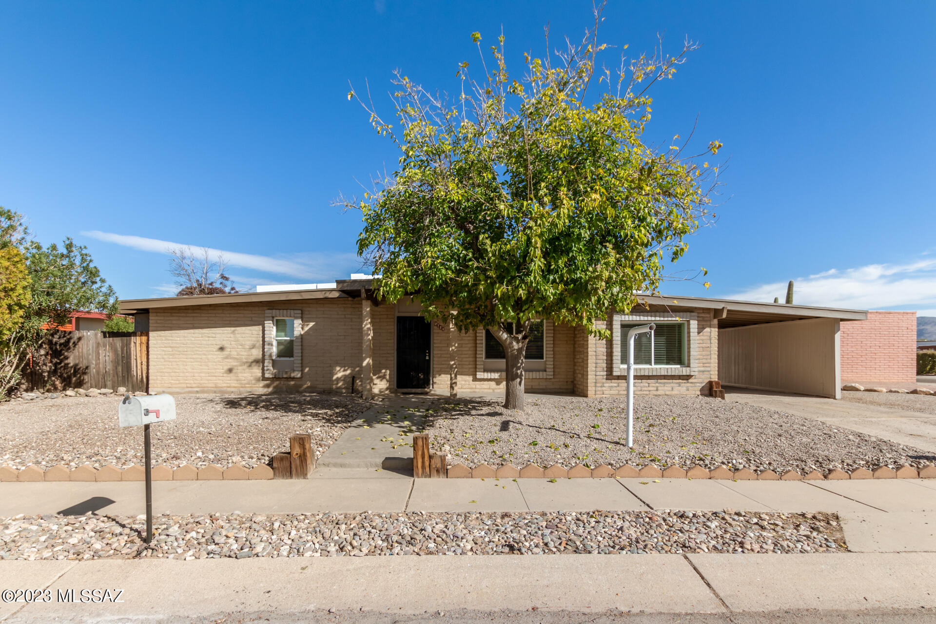 Stunning double brick, ranch style home located in East Tucson. This beautiful home is turn-key & has been fully renovated. The home features 4 bedrooms & 2bath split floor plan. This is the perfect blend of modern comfort and classic charm. As you step through the front door, you'll be greeted by a spacious living/dinning area & family room. Picture yourself cooking in a Massive ALL GRANITE counter top kitchen featuring a plethora of white cabinetry, giving it a light & airy feel. Relax in the primary bedroom providing a pristine private bathroom with designer tiled walk-in shower. Enjoy the beautiful Arizona weather relaxing in the covered patio, and large back yard. Close to Lakeside Park with fishing, boating, walking trails and picnic tables. Schedule your showing today!