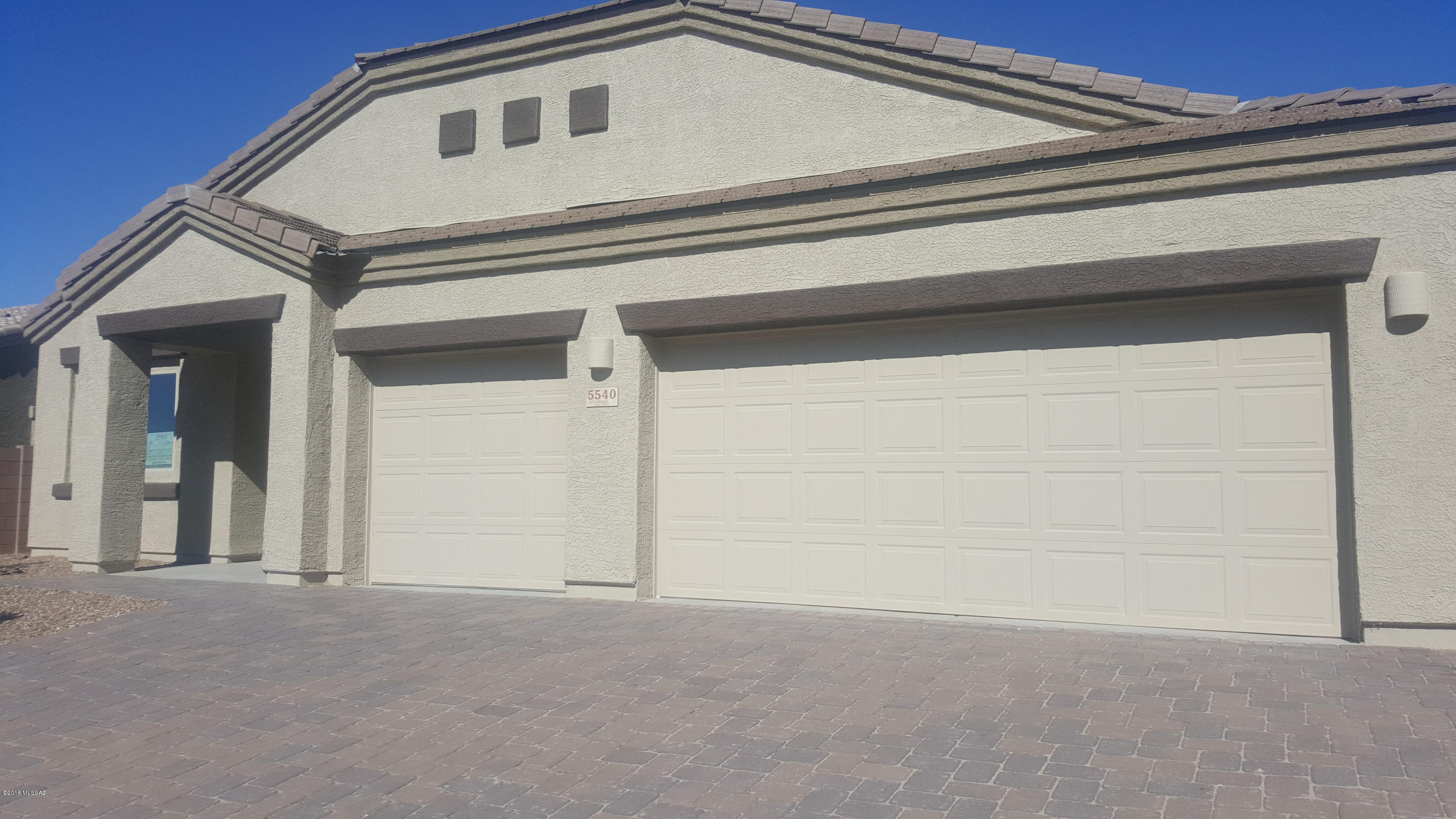 A must see!!! Wow you won't believe how spacious this home is! The huge great room and split bedroom floorplan make this home very livable.  Features include a dazzling complete with upgraded staggered espresso Birch cabinets complimented by granite slab countertops and stainless steel gas appliances including double ovens plus a large island.  At Sterling Meadows you will enjoy the vibrant natural desert setting on wide lots! Small community - exclusive one story neighborhood. Ready now - quick move in.