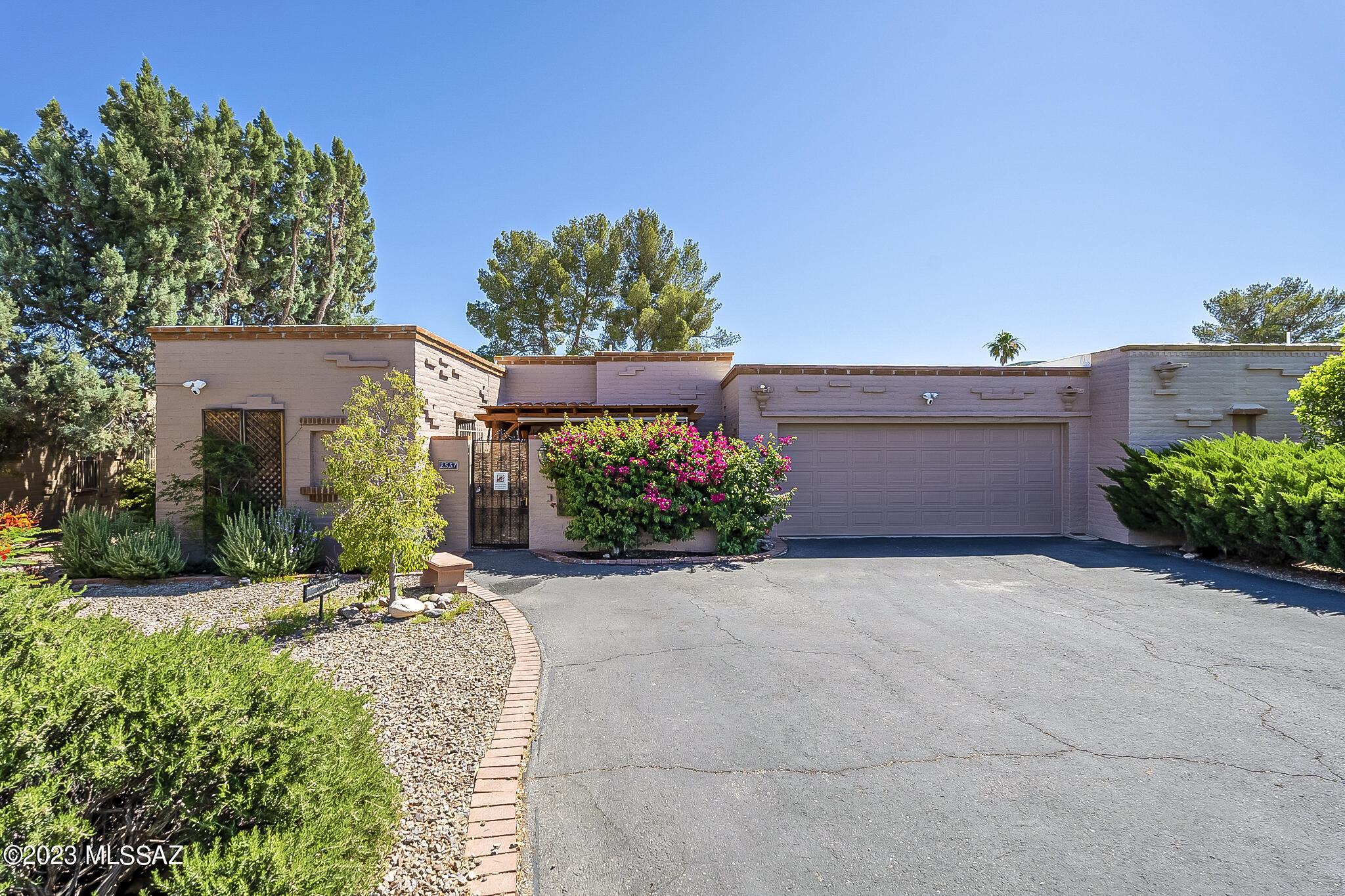 Very Nice location in a valued community! Quite yet close to shopping, dining and bus lines! Easy walk to Tanque Verde creek trail as well. Townhome features 2 large bedrooms with a nice den. Updated Kitchen and Bathrooms. Just about everything has been upgraded or replaced, windows, countertops, electrical, roof, mechanical (heating/ac) flooring, plumbing, fixtures, poly pipe replaced.  Extra Breakfast room expanded off the laundry room. Nice flow with the living and dining areas which include a nice gas fireplace. HOA covers water, sewer, common areas, 2 pools, clubhouse, and landscaping.