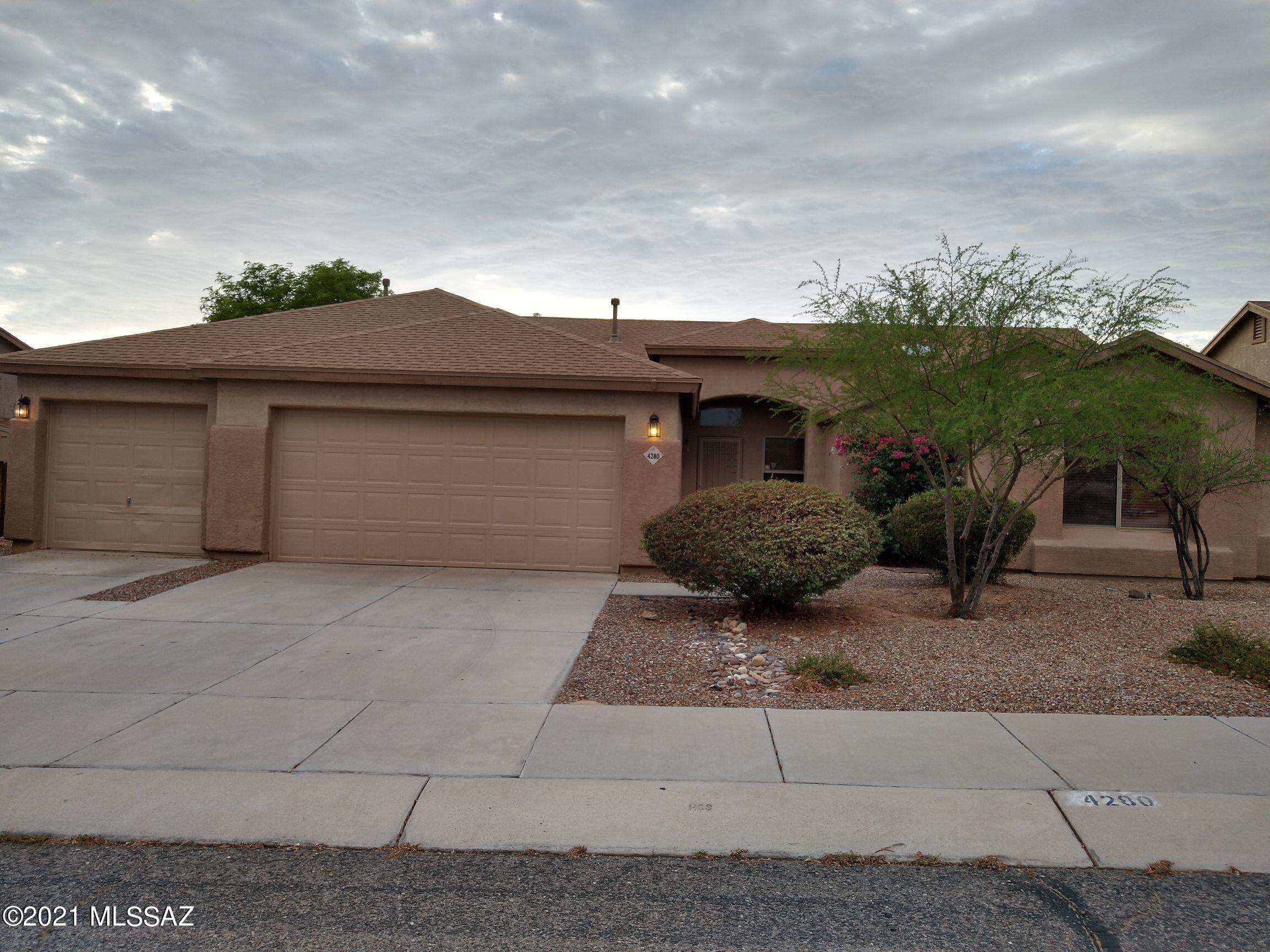 Wonderful opportunity to own this beautiful  home located in a very desirable neighborhood in NW Tucson. Home offers 3 bedrooms plus a large den that could easily be converted into a 4th bedroom, the master bathroom has been tastefully remodeled. Greatroom open to kitchen and dining areas, granite countertops and ceiling fans throughout; carpet in only one bedroom, the rest has hardwood or ceramic tile floors. Three car garage with plenty of shelves for storage. Exterior painted July 2021 as well as most of the interior. Backyard is spacious and has an outdoor kitchen along with a gas kiva fireplace and jacuzzi making it great for entertaining.  Don't wait, come see your new home today.