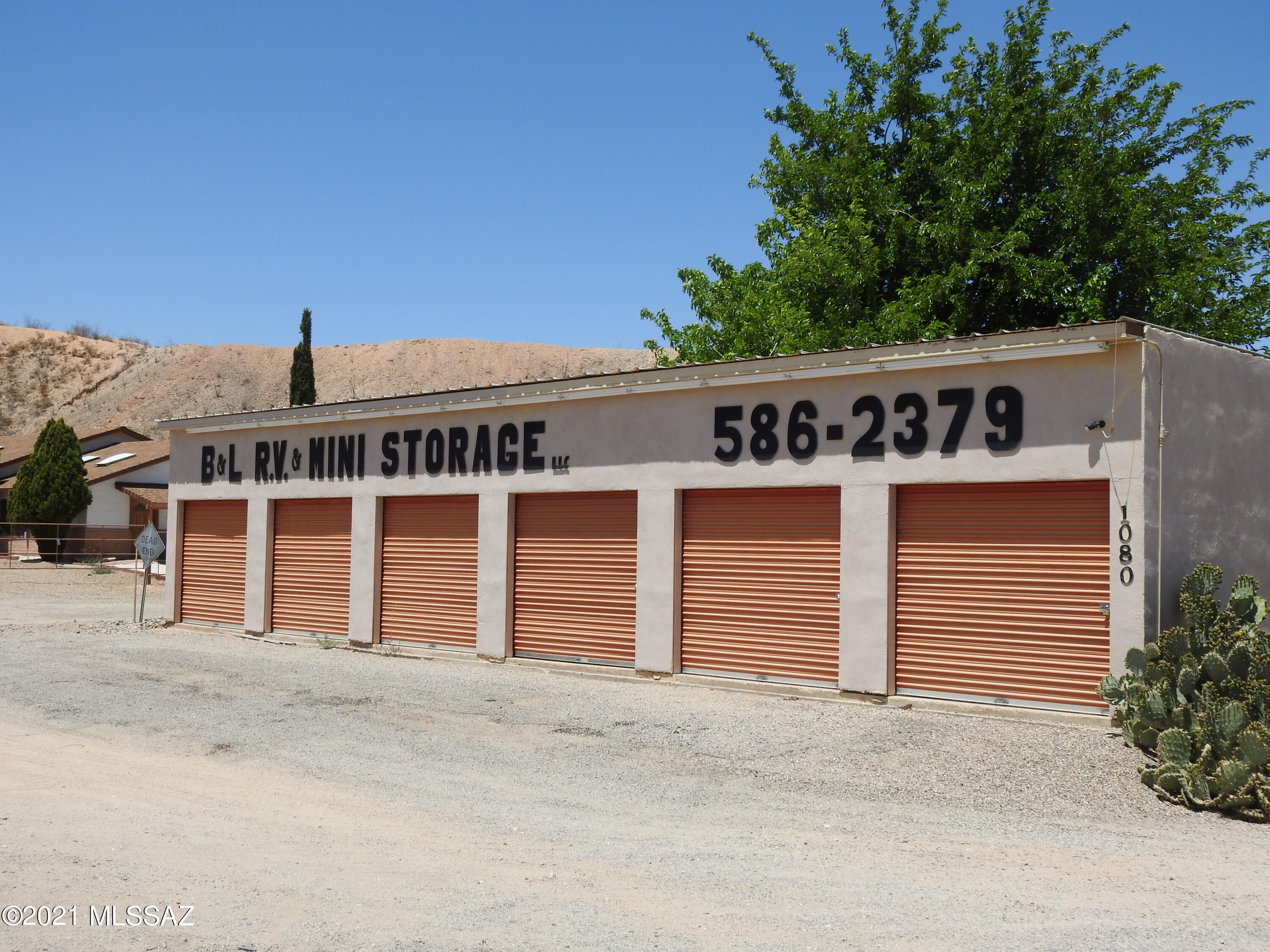 Here is your opportunity to own and operate this profitable mini storage and storage facility on 4th Street which offers  128-sf 
 of frontage on 4th Street and easy freeway access.  Zoning is ''General Business'  which has many additional business uses.  The front parcel includes a spacious  approx 3072-sf, 3 bedroom , 2 bath home which has a spacious unfinished basement,  The property is designated in the Opportunity Zone. You currently have 172 units, with options for more, plus you have from 50 to 125 Possible RV Storage Spaces.   Included in this sale are two Parcels- 123-12-008B & 123-12-008A.  If you are looking for a great investment opportunity now is the time to check this one out.  Seller is offering to finance-call listing broker for financial details and showings.