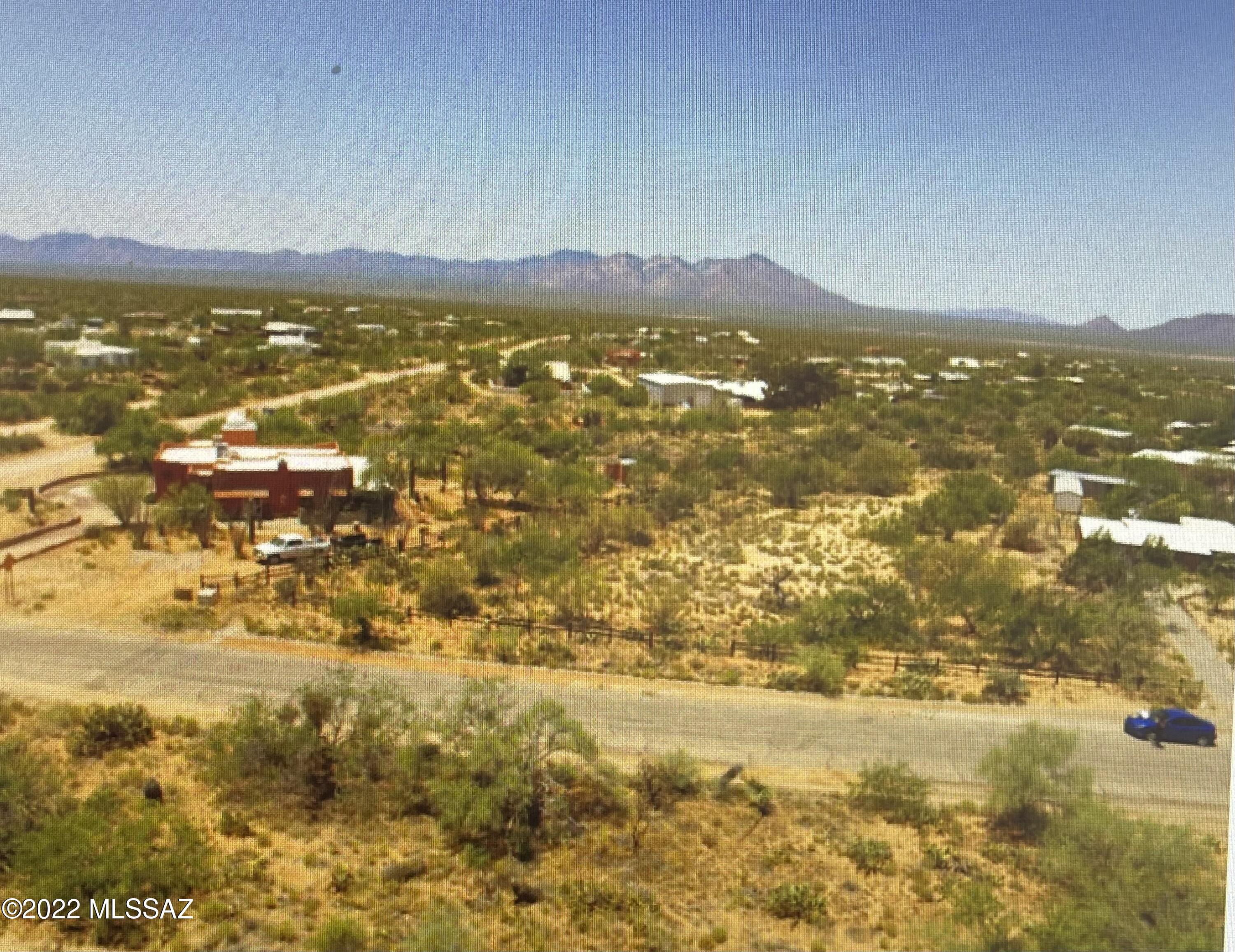 Perfect sized lot to build your home and have room for the animals. Beautiful Views on paved street and all utilities at lot line.