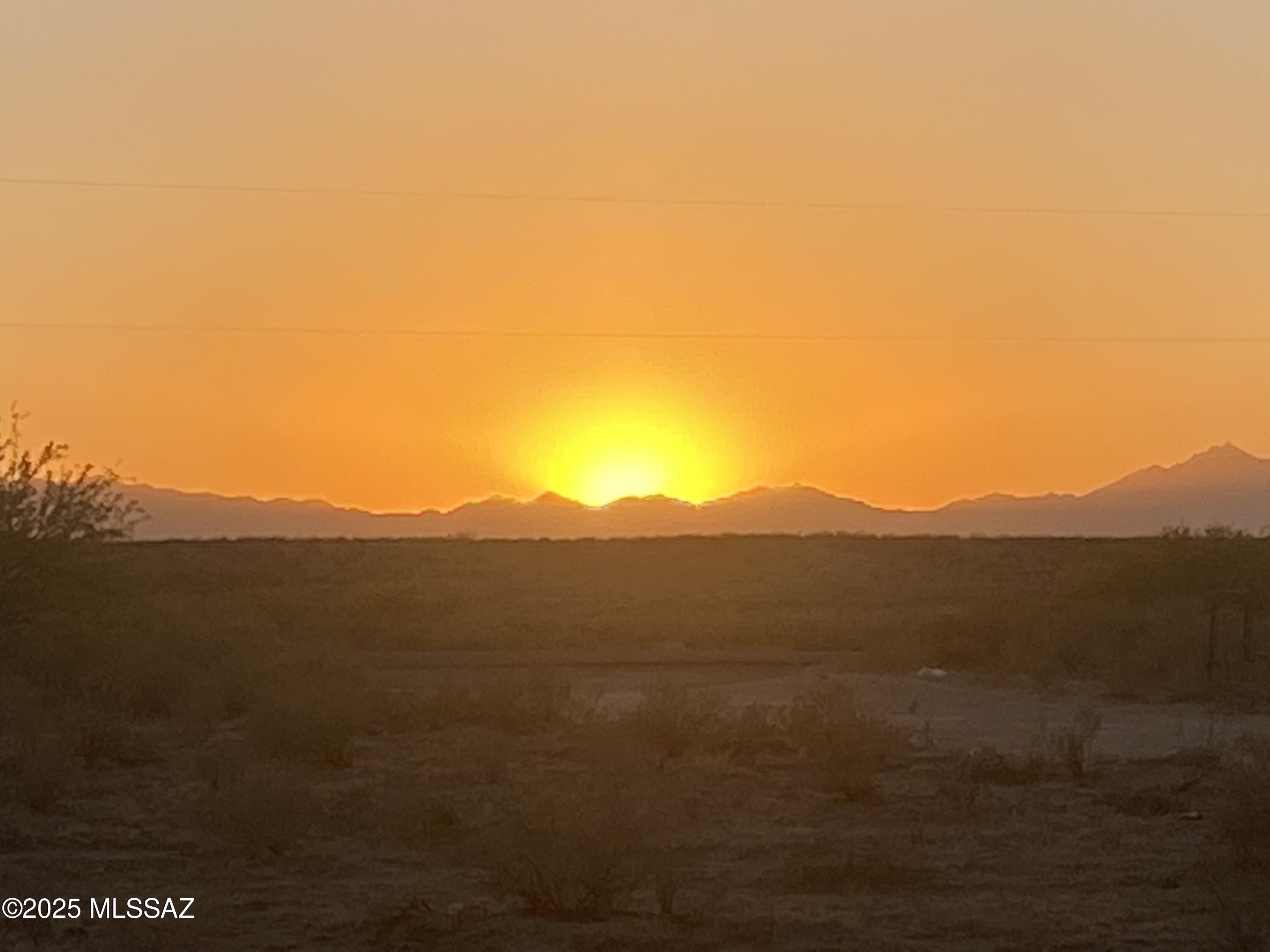 A One Acre Building Parcel Located in White Fence Farms Subdivision.  City Water is at the property line and Electrical power is nearby. This Handsome Homestead is nestled in the perfect spot to enjoy spectacular mountain views, quiet sunsets, and Dazzling Night Skies. The calling of coyotes and quail complete the picture. Public land is across the street and you are minutes from areas where you can fish, hunt, hike, and camp. Meanwhile, ''civilization'' is a few minutes back into town.   Interested?  Better call fast. ~ It may not last!  ~~~ BTW... want more acreage?  The adjacent one acre parcel is also for sale.  Combine them and you will have a very reasonably priced 2 Acre Building Parcel!