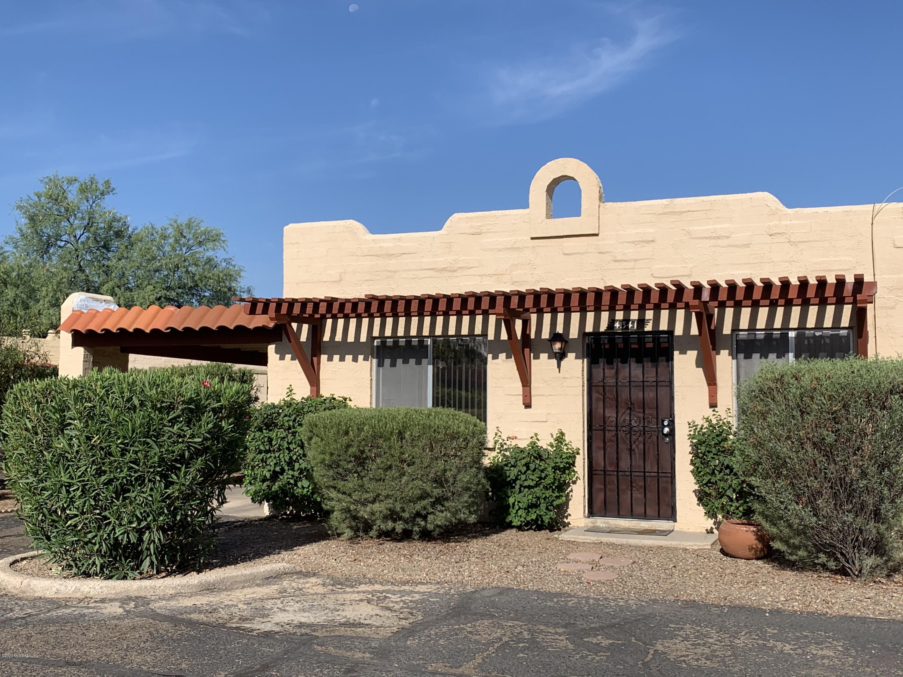 Secluded Central Cottage! Check out this darling town home, located in a great location close to everything! Updates from July 2020 include: Inside paint, 2 coats of roof coating, refinished vanity top, tub and surround, new outside lights, new toilet, carpets cleaned, new locks. Other updates from 2019 include: new microwave and hood, new garbage disposal. Outside of unit painted two years ago.  Come take a look today and make it your own!