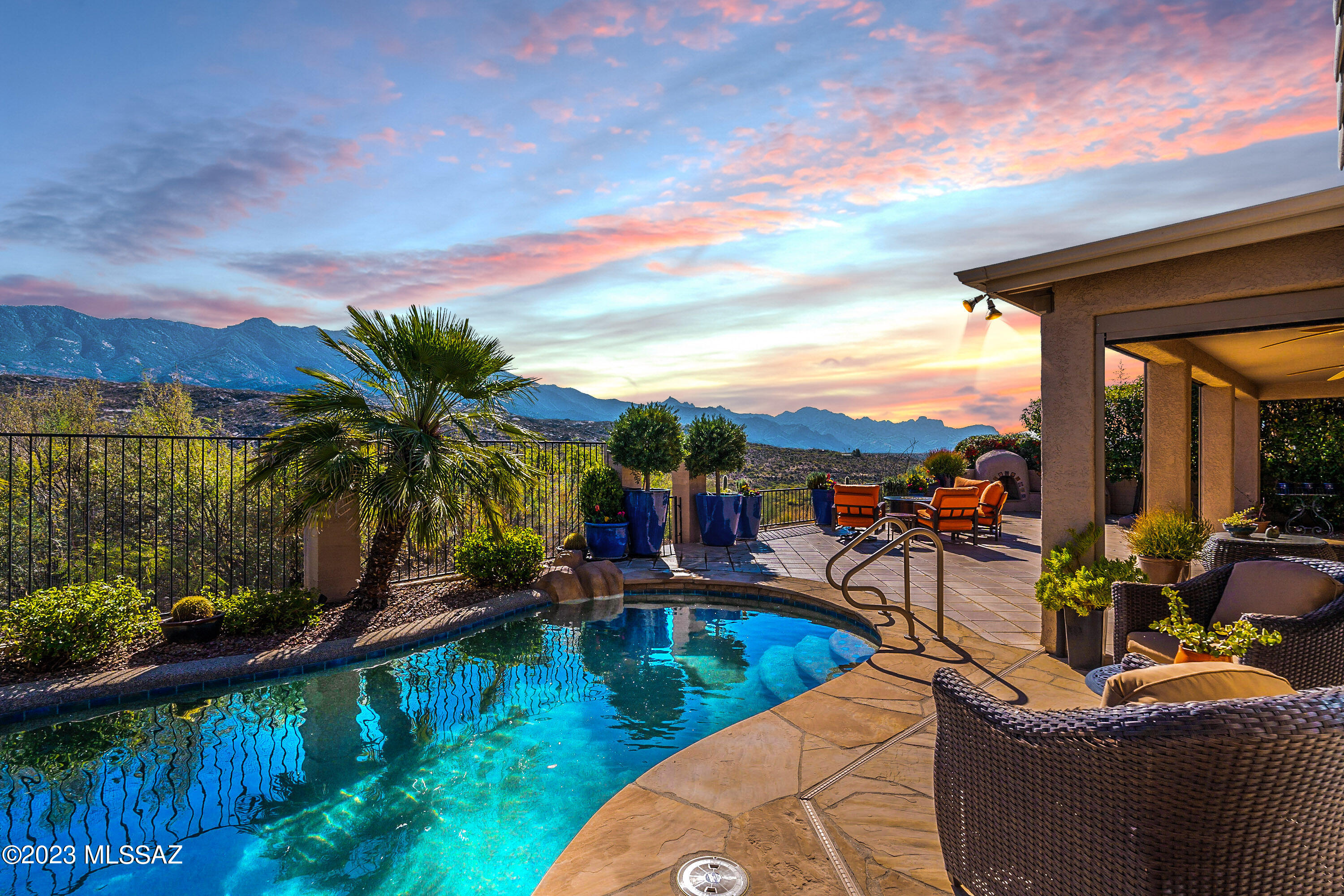 Enjoy unparalleled Catalina mountain views from inside and out - expansive patio w/heated salt pool and spa, kiva propane fireplace, and plenty of room for entertaining or relaxing. This meticulously maintained Galleria has updates galore. Heart of the home - remodeled kitchen adorned w/cherry cabinets, stunning quartzite counters, stainless appliances with gathering space adjacent to family room w/gas fireplace. Primary suite exudes relaxation offering lavish walk-in shower, updated cabinets, two walk-in closets, a sitting area w/mtn vistas, & slider to patio. The office has built-in cabinets and bright lighting. Cozy living and dining rooms. Tile & exquisite hardwood flooring on the main, and carpet upstairs for the comfort of your guests.Don't miss luxury desert living in SaddleBrooke!