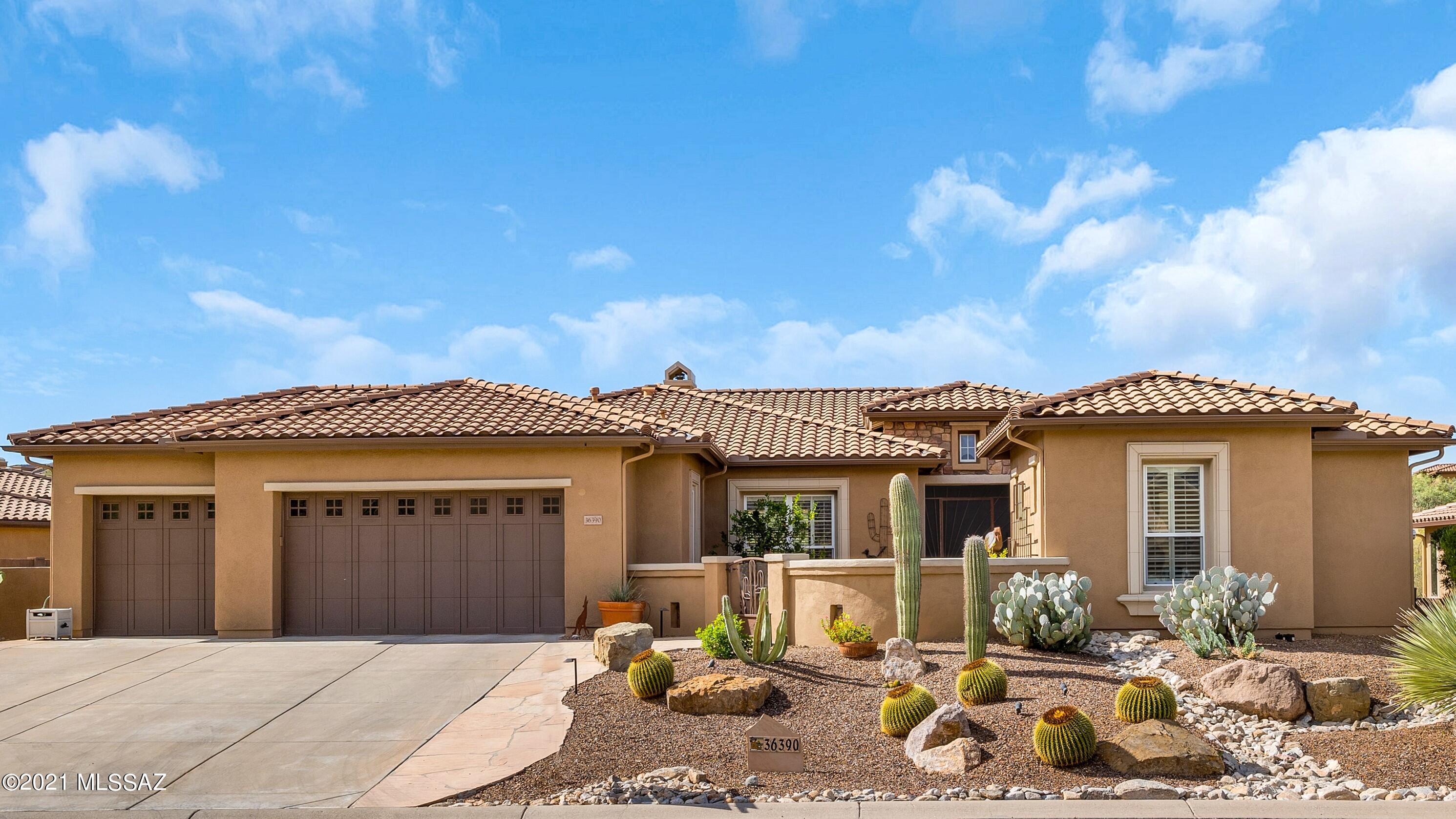 We're proud to present a Sabino with Guest House with Mountain Views. This 3 Bedroom + Den / 3.5 Bathroom / 2,908 SF / 3 Car Garage Home is just what you've been waiting for! Front Courtyard with mountain views. Ceramic tile floors on the diagonal thru most of home, except bedrooms. Shutters. Great room with fireplace & slider to patio. Kitchen with granite counters, tumbled travertine backsplash, cherry cabinets, large island & walk-in pantry. Owner's suite has bathroom with walk-in shower, tub, &  walk-in closet. Powder room & Den with French doors. Guest bedroom with en-suite bathroom. Guest House with bathroom. Laundry room. 3 Car Garage with man door. Covered patio with electric rolling shades. Pergola with extended patio. BBQ station & fruit trees. Lovely landscaping & gated yard.