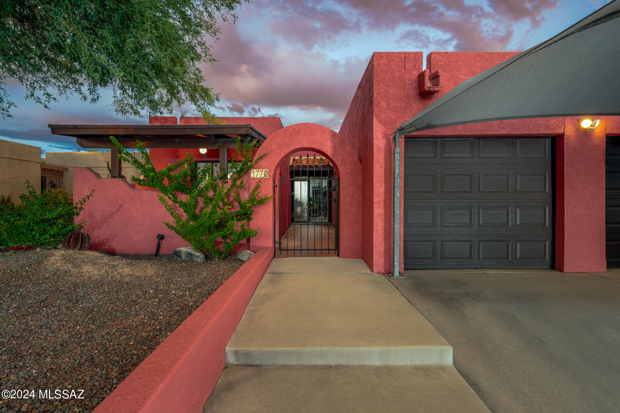 Welcome to a charming home that perfectly blends comfort and style. This delightful property offers 3 bedrooms and 2 bathrooms, along with a convenient 1-car garage. Step through the private gated entry to find a covered patio that sets the tone for the cozy and inviting atmosphere within.

Inside, the kitchen shines with its pristine white cabinets, offering ample storage and a bright, airy feel. The dining area, featuring a lovely wood fireplace, creates the perfect spot for gathering and making memories. The low-maintenance backyard is a serene retreat, tastefully landscaped and highlighted by a ''spool''—a unique combination of spa and pool, ideal for relaxation year-round.

Your next chapter starts here!