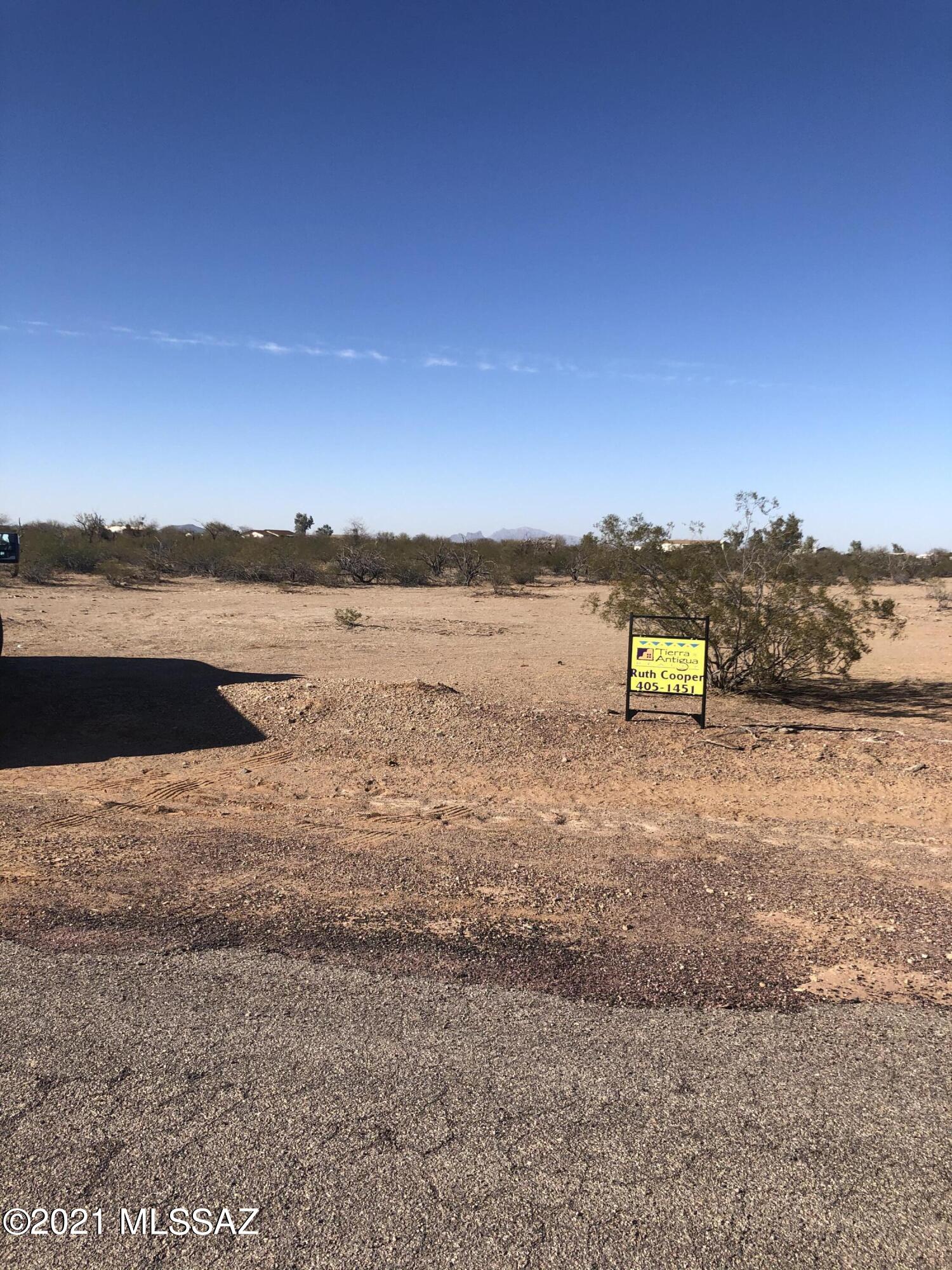 Want to live the rural life? Here is a beautiful 4.13 flat lot to build on or put a Manufactured home on. This lot has a well site, electrical transformer and phone on the southwest corner of the property. The property to the north (18010 N Husker Ln., with septic) is also available for sale if someone would like to combine the two for a large lot of 8.26 acres! Escrow with Title Security, Marcia Cormack, 520-219-6451, as title work has been completed.