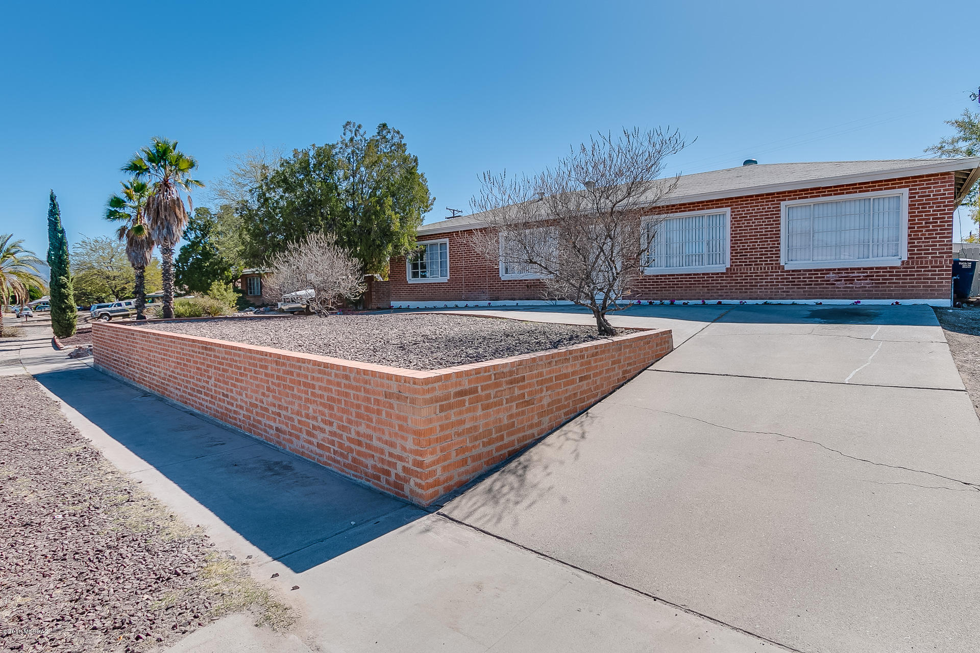 Range Pricing: Seller will accept/counter offers between $199,000 and $209,000. Great East side home with 4 bedrooms, 2 bathrooms, 1936 square feet in a very desirable neighborhood. It's located just off the Park Place Mall and other nearby shopping centers, restaurants and hospitals. Huge kitchen with maple cabinets that opens to the spacious dining area. This house has been updated with A/C and tile everywhere except the bedrooms which are carpeted. There are ceiling fans throughout the house and has a fireplace to keep you warm during the winters. This home qualifies for Zero Down Payment, contact agent for details.