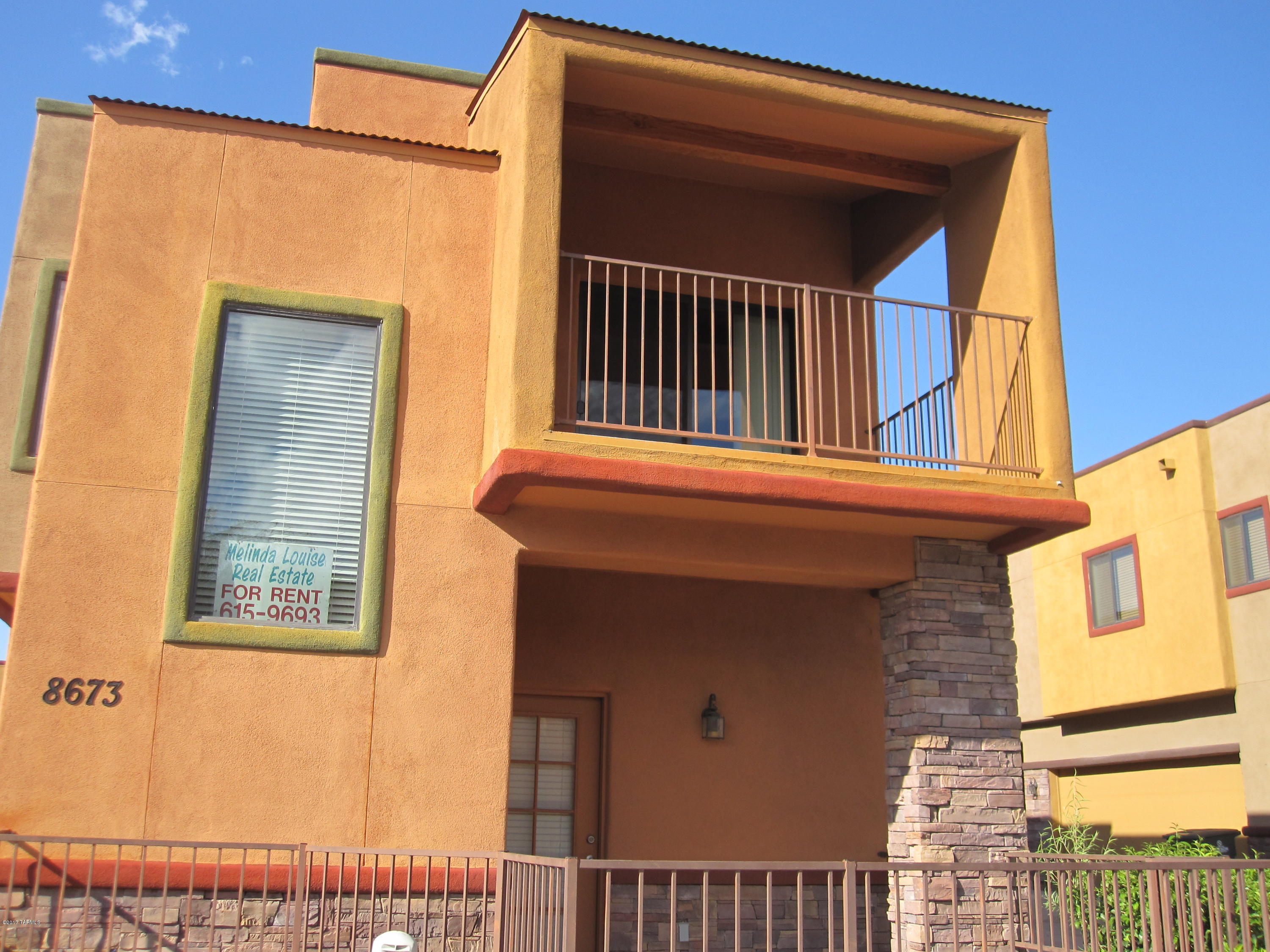 This unique 2 story home has a bedroom and a full bath downstairs and 2 full bedrooms and a full bath upstairs, the living, dining and kitchen are all upstairs. There is a small yard with an upstairs balcony, 2 car garage, granite countertops, neutral colors, black appliances. This property is located in a small development on the Eastside. Pets negotiable. Tenant to pay $40 per month for water, trash and sewer.