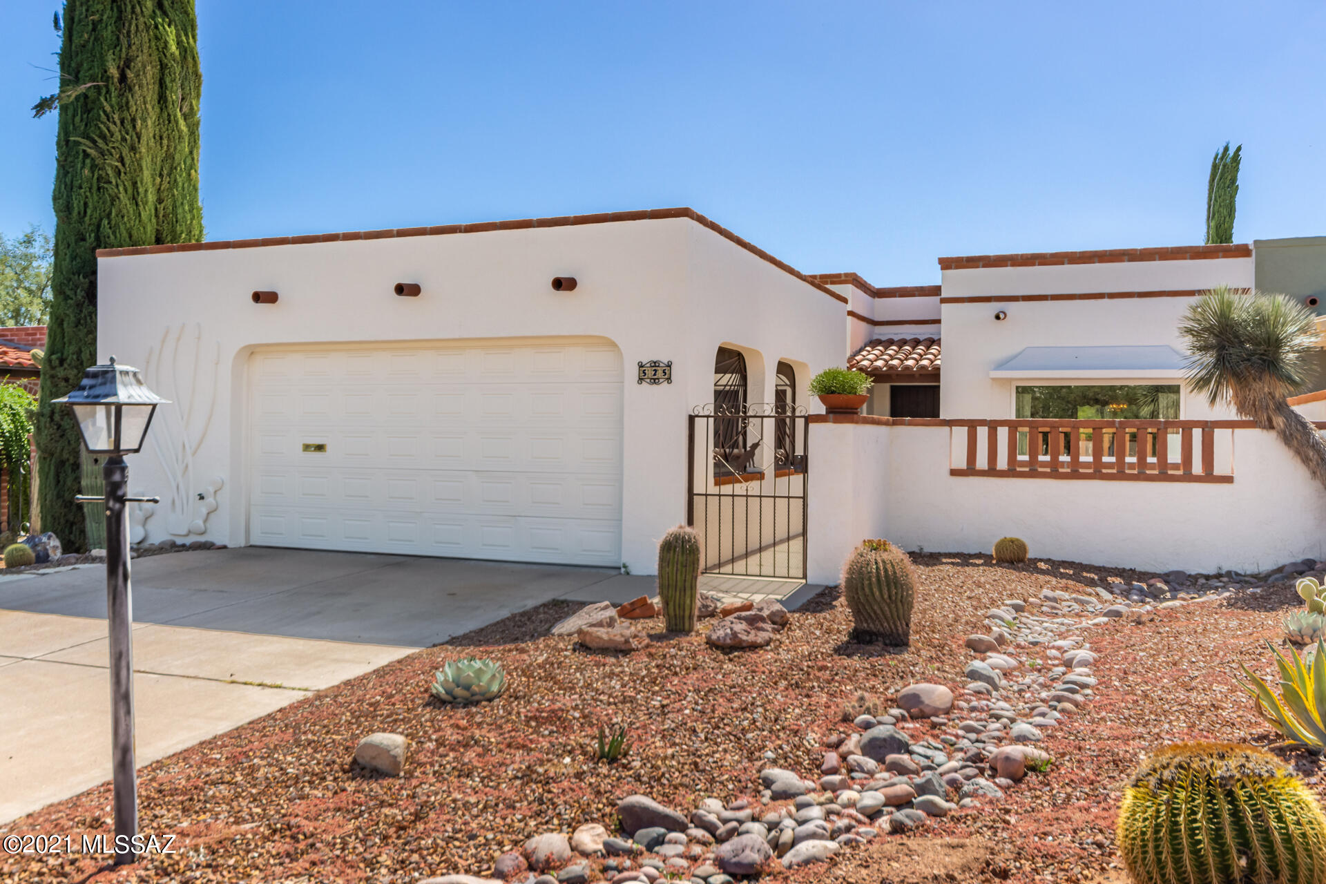 Charming Three bedroom, two bath townhome with mountain views. This house checks all the boxes for part-time or full-time living. It is surrounded by walking trails and pretty desert. There is a large two car garage with lots of storage, and you will love the new energy efficient windows and sliders. The cute kitchen has a LARGE pantry. Located in Townhouse 4, there is an abundance of natural desert with trails to enjoy the flora and beauty of the Sonoran Desert. This house will make you smile. You'll immediately feel right at home.