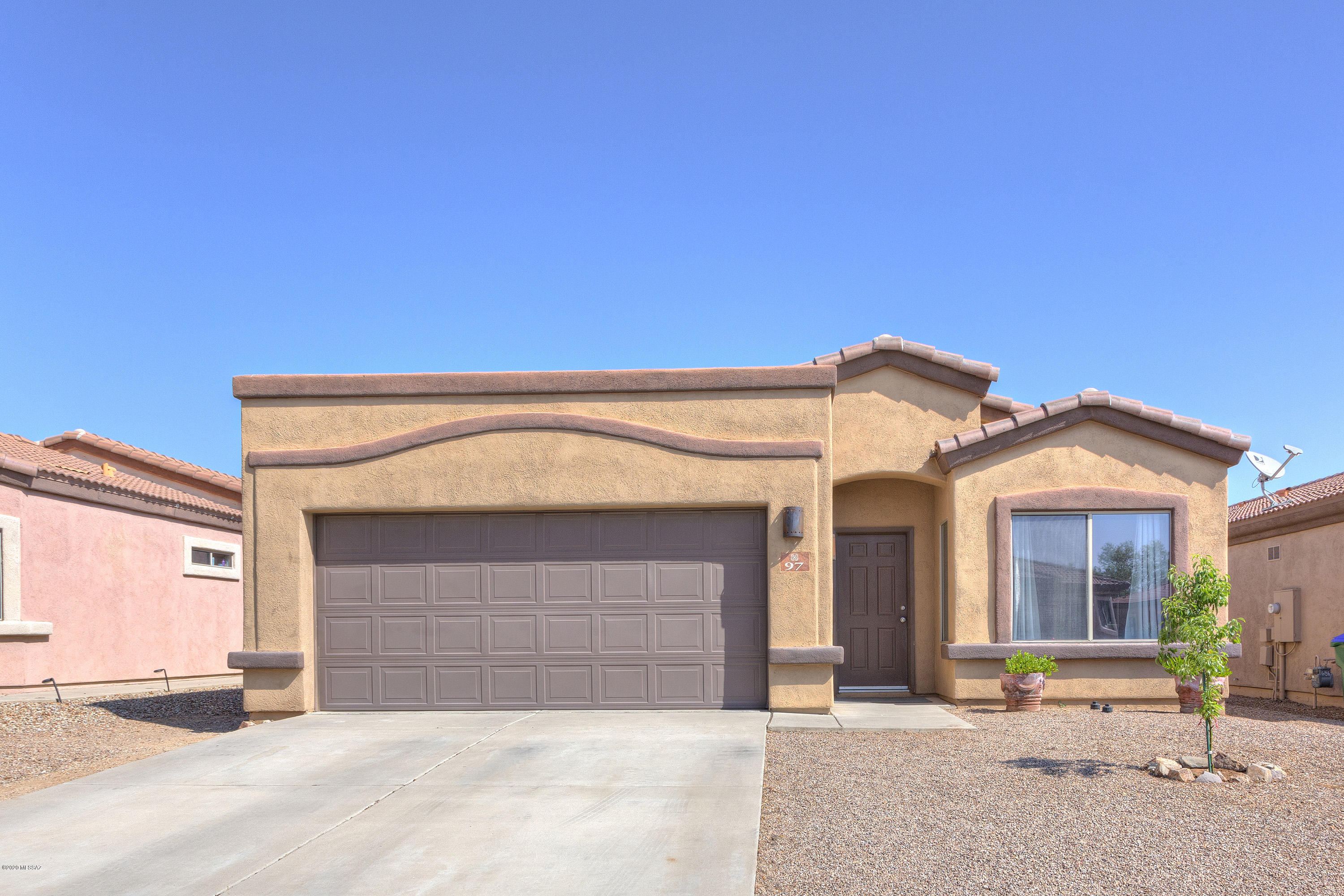 THIS PRISTINE, ORIGINAL-OWNER HOME HAS MANY BUILDER UPGRADES (9' CEILINGS, 22' GARAGE, ETC.) AND HAS BEEN TASTEFULLY REFRESHED. 
MOVE-IN READY WITH NEWER FLOORS AND A FRESHLY PAINTED INTERIOR, YOU WILL FIND A SEPARATE LIVING AND DINING AREA BEFORE YOU ENTER THE THE KITCHEN/GREAT ROOM.  KITCHEN UPDATES INCLUDE REFINISHED CABINETS; GRANITE COUNTERS;  STAINLESS APPLIANCES; GAS COOKING; AND ALL NEW HARDWARE, FIXTURES, AND CEILING FANS.  THE 4 BEDROOMS PROVIDE PLENTY OF SPACE WITH EASY ACCESS TO THE RENEWED JACK-N-JILL BATH, AND THE REVITALIZED MASTER SUITE INCLUDES A SEPARATE SOAKING TUB AND WALK-IN SHOWER AND CLOSET.  THE REAR YARD OFFERS DESERT LANDSCAPING WITH A PATCH OF ARTIFICIAL GRASS AND NO REAR NEIGHBORS!  NO SHOWINGS PRIOR TO OPEN HOUSE ON 9/26/20 FROM 11-2.  FACE MASK REQUIRED.