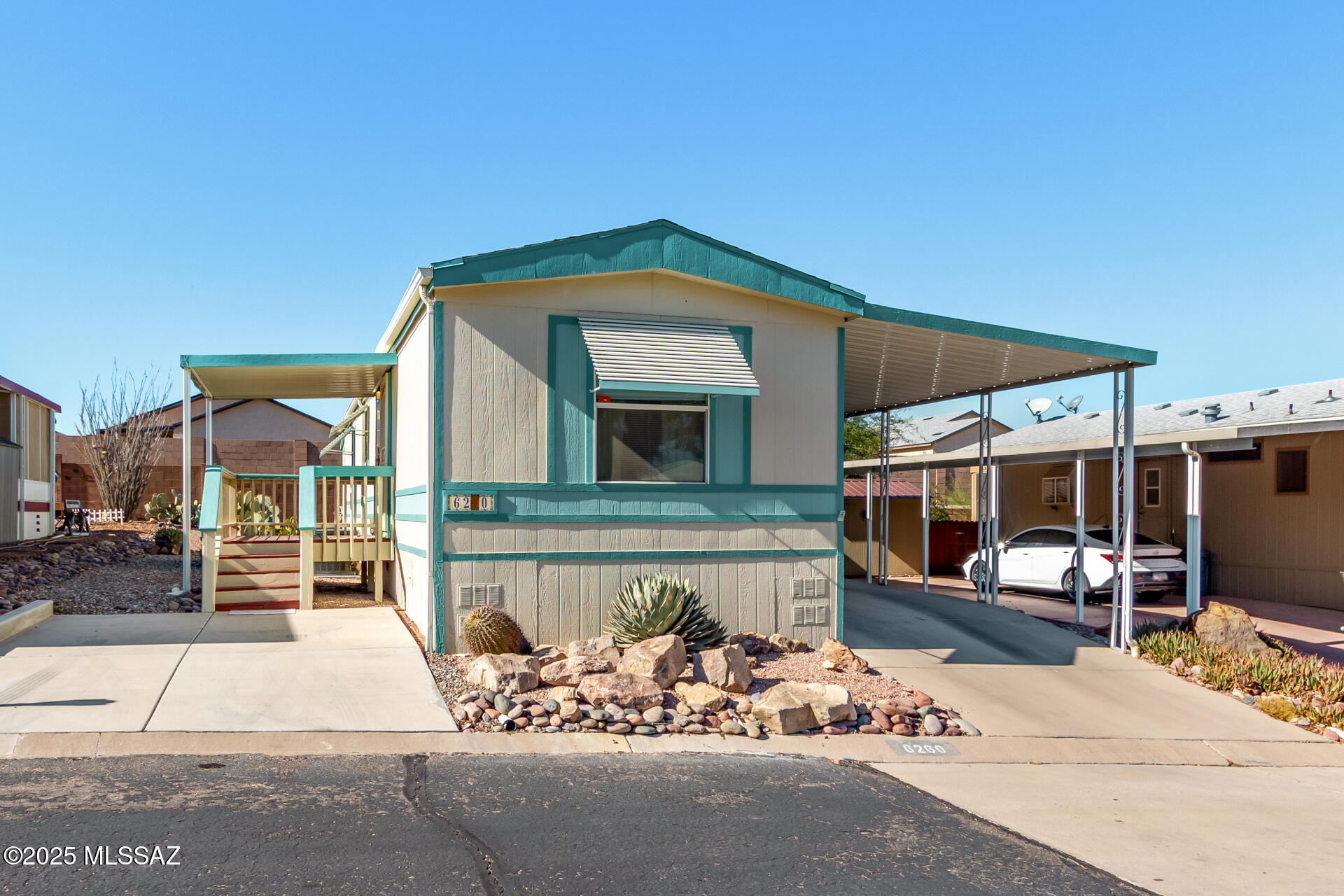 MOTIVATED SELLER! Great opportunity to own this lovely 2-bed, 2-bath home with carport parking! Excellent location, close to various dining spots, schools, and more. Be welcomed by a cozy front porch upon arrival. Come inside to find an inviting living room featuring wood-look flooring, neutral palette, and vaulted ceilings that add to the spacious feel. The eat-in kitchen offers plenty of cabinets topped with crown molding and a convenient breakfast bar. Airy primary bedroom provides a walk-in closet for easy organization and a private bathroom, bringing comfort to your daily routine. Imagine tranquil evenings on the relaxing deck, perfect for enjoying a good book or a refreshing drink. Don't miss out on this value! Hurry! Owner/agent