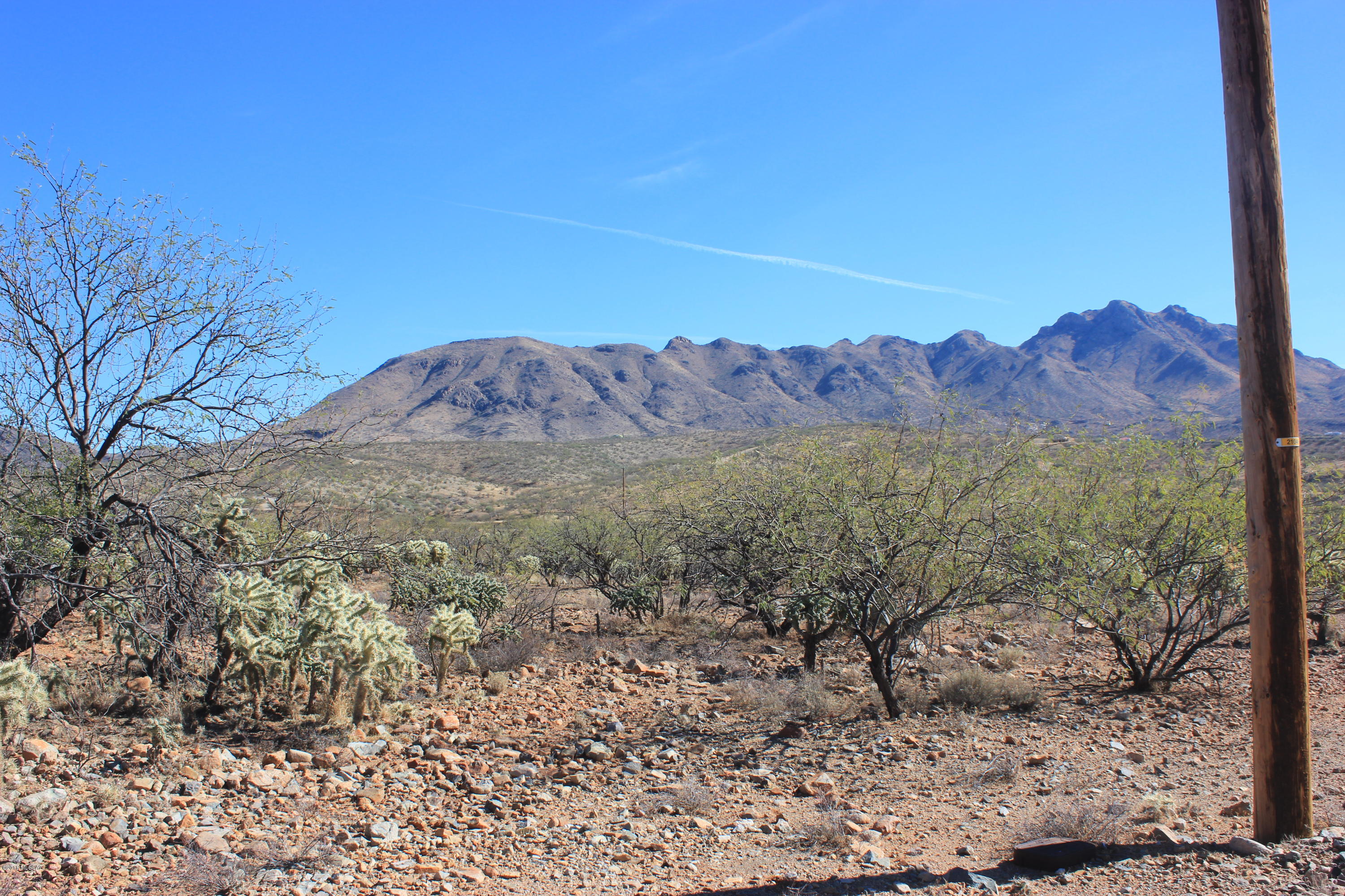 Residential building lot with terrific mountain views.  Road is dirt for about a three quarters of a mile.