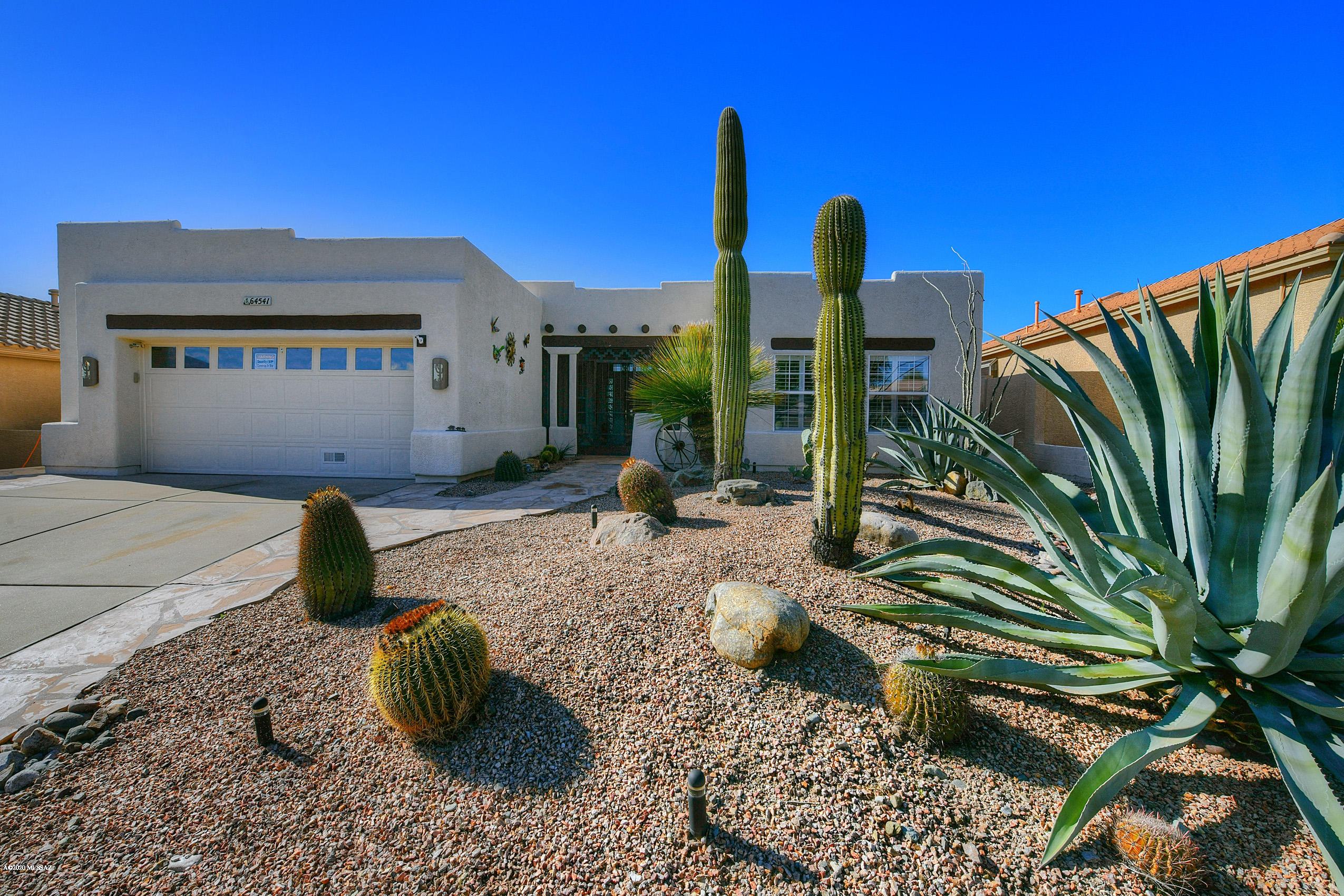 NEW: 2 HVACS, ROOF & WATER HEATER! SaddleBrooke living at its finest! Extended 2BR/3BA +Den (2,731 SF) Estancia model has VIEWS: south facing golf course/east facing mountains.  Updated Santa Fe boasts living room w/soaring ceiling, formal dining, den w/workstation, plus great room w/addition hosting fireplace & 3/4 bath for studio or guest space. Chef's kitchen hosts an island, nook w/bay window, wine fridge and granite counters. Private Master suite has large walk-in shower & closet. Enjoy the central screened-in patio or outdoor patio w/ramada & built-in BBQ. Added surround sound, plantation shutters, sunscreens, garage cabinets & golf cart space. STUNNING SUNSETS! SaddleBrooke is Tucson's Premier Active Adult Community offering Clubs/Pool/Golf/Tennis/Pickleball/Performing Arts Center.