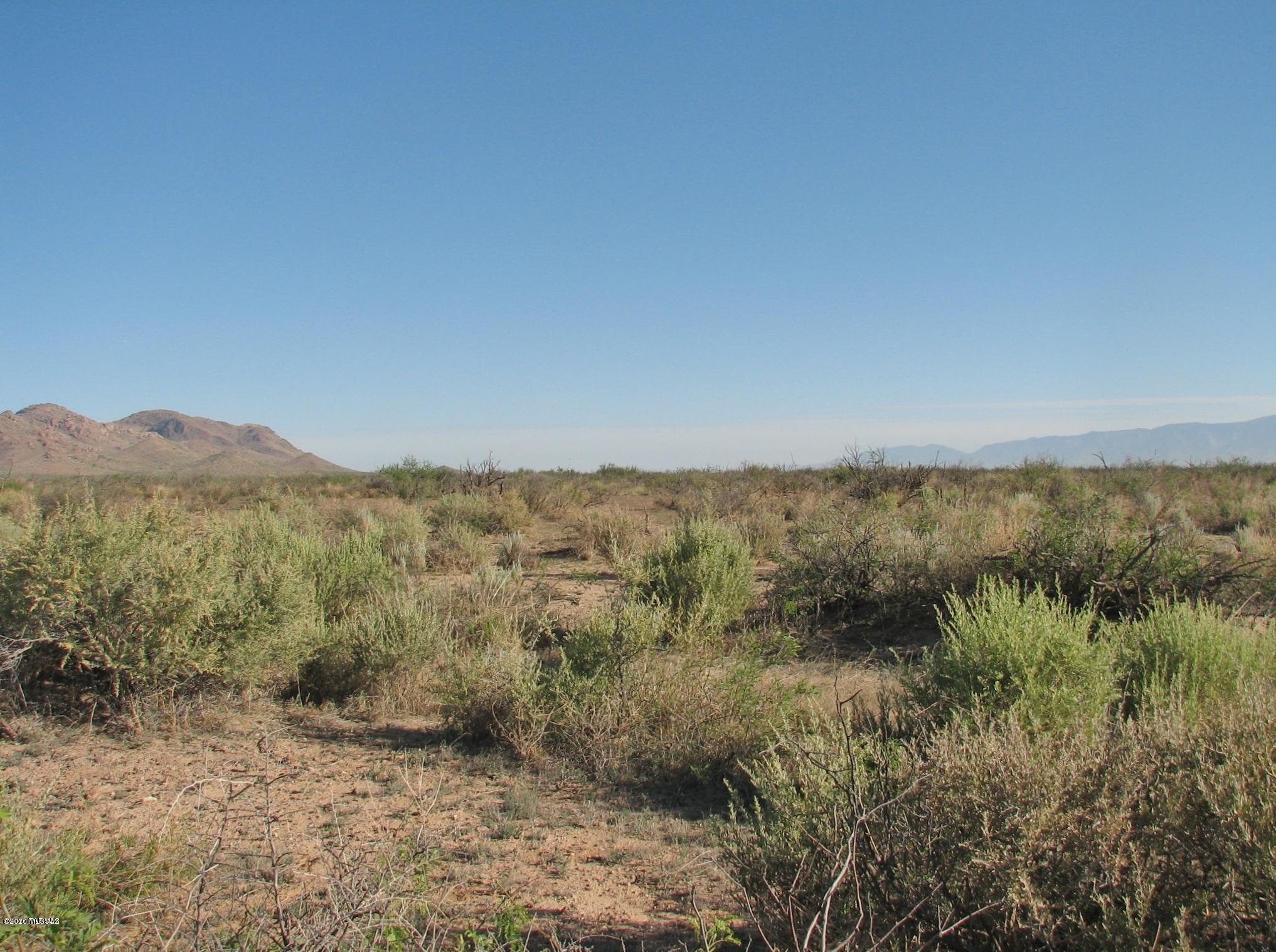 Virgin Land bordering operating farms and Federal Land !  Ideal candidate for farming, trees, ranching.   Elevation is 4250 ft.   Sweeping views of the mountains and valley.    Hard to find large parcel in farm/ranch country.