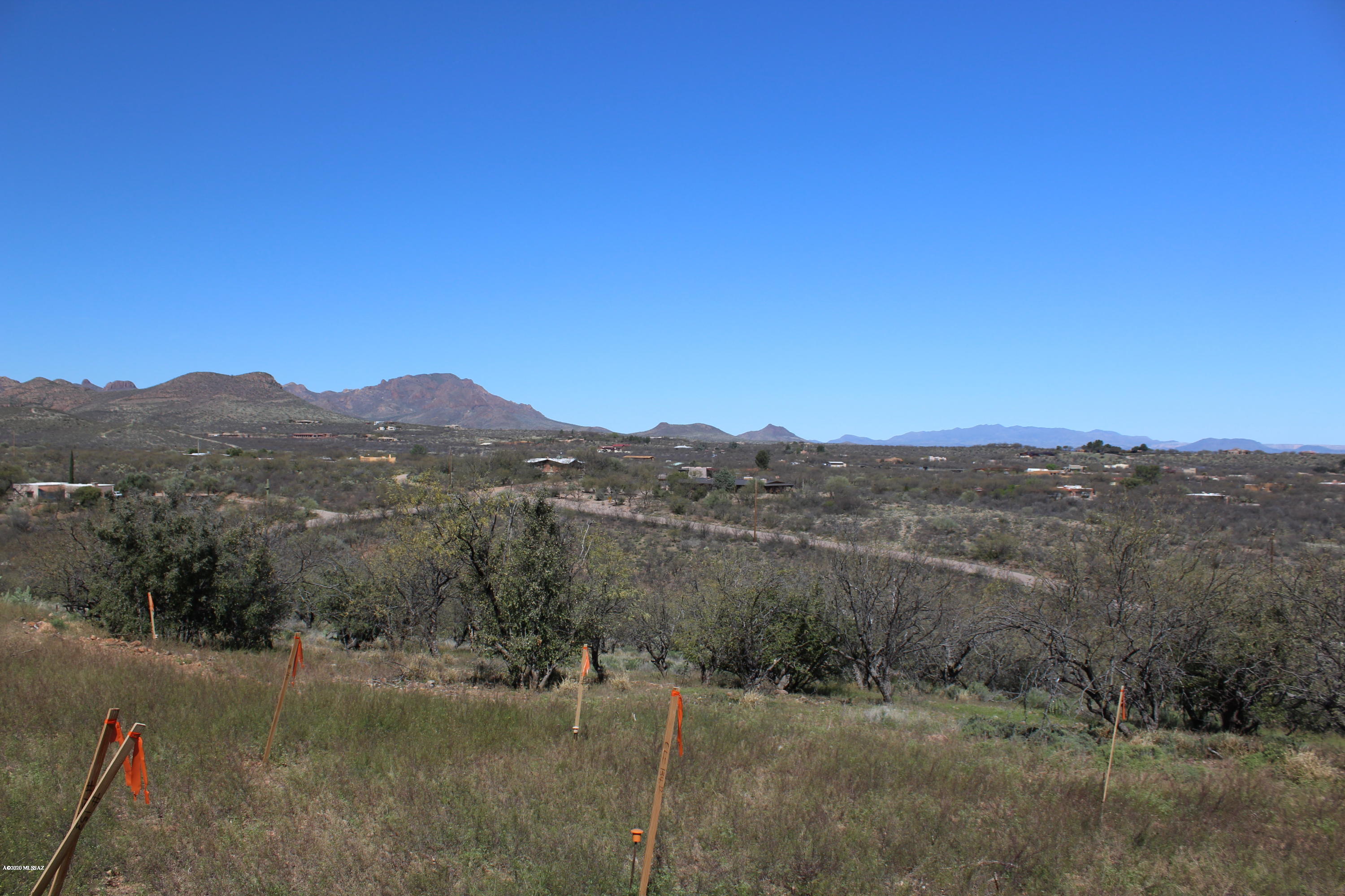 View lot with natural gas and electric to lot. Septic system is installed. Building plans are available. The footprint is flagged. Great location with easy access to the Village of Tubac, shops and galleries.