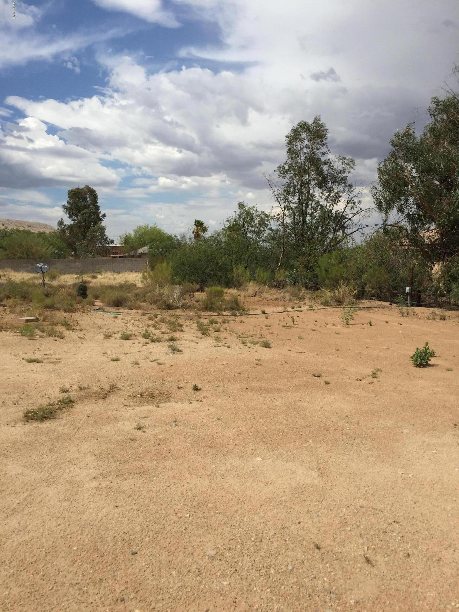 Location! Location! Location!
Almost an acre lot right off La Canada in town Sahuarita! 
2400sf maintenance shed and RV included. Slab for 1800sf home already poured along with retaining walls. Plans available through seller. All utilities to lot line. Septic installed.