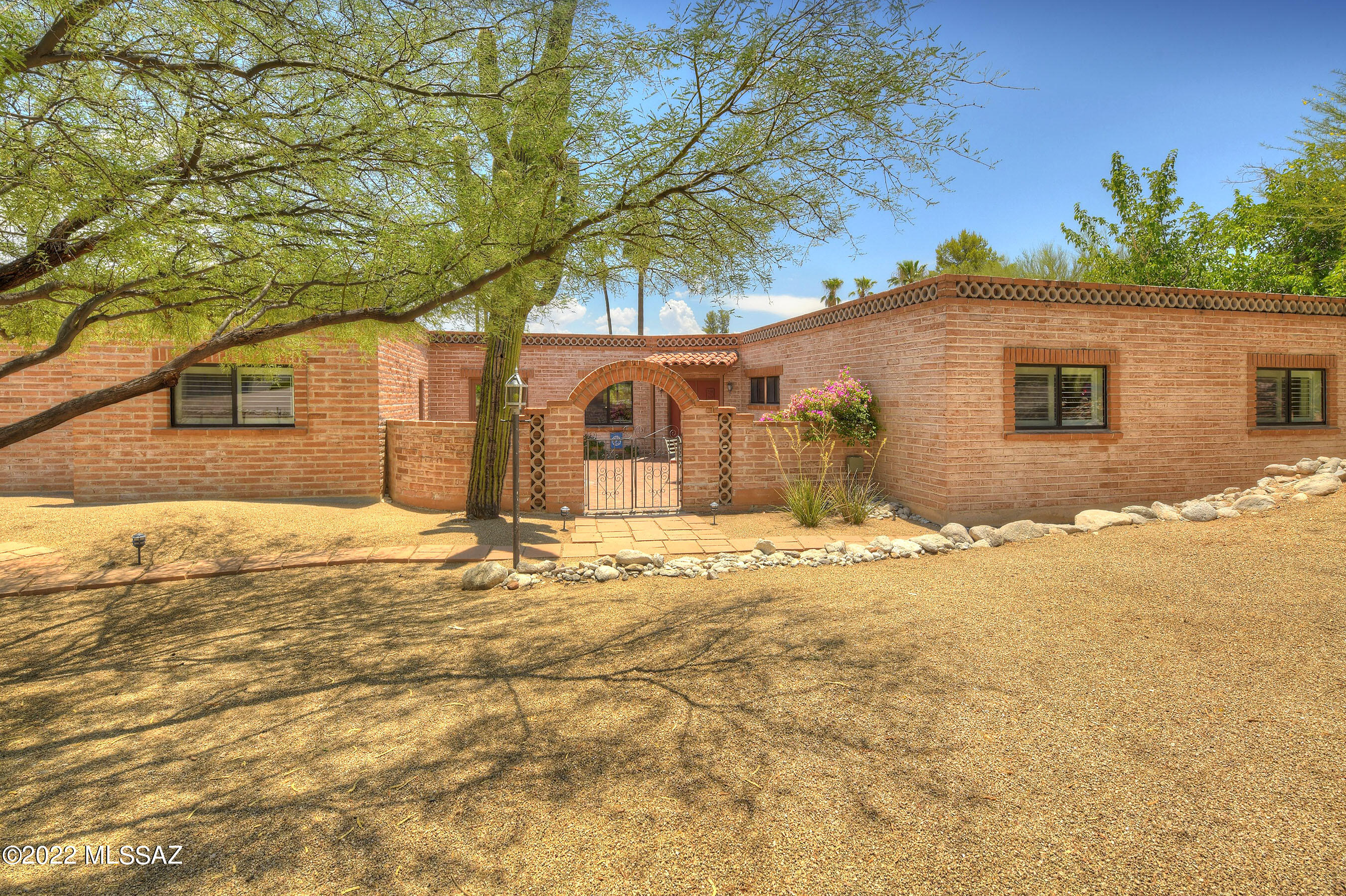 Prime lot in this much sought after Sabino Vista neighborhood. Main Entry through a spacious courtyard through the glass doors and into the large Great Room. Kitchen boasts an oversized ''Black Onyx'' granite island countertop with a wine cooler and ample storage. Covered rear patio with sparkling pool, grassy areas with plenty of room for entertaining or Sunday BBQ's. This home has so many amenities: Fruchthendler Elementary school is a short distance, Close to Sabino Canyon, shopping and Town, Oversized 2 car garage plus golf cart garage with an 8 x 6 workshop, Separate 8 x 8 office. This 2769 sq. ft. 5BR/3BA move in ready home is awaiting your arrival.
