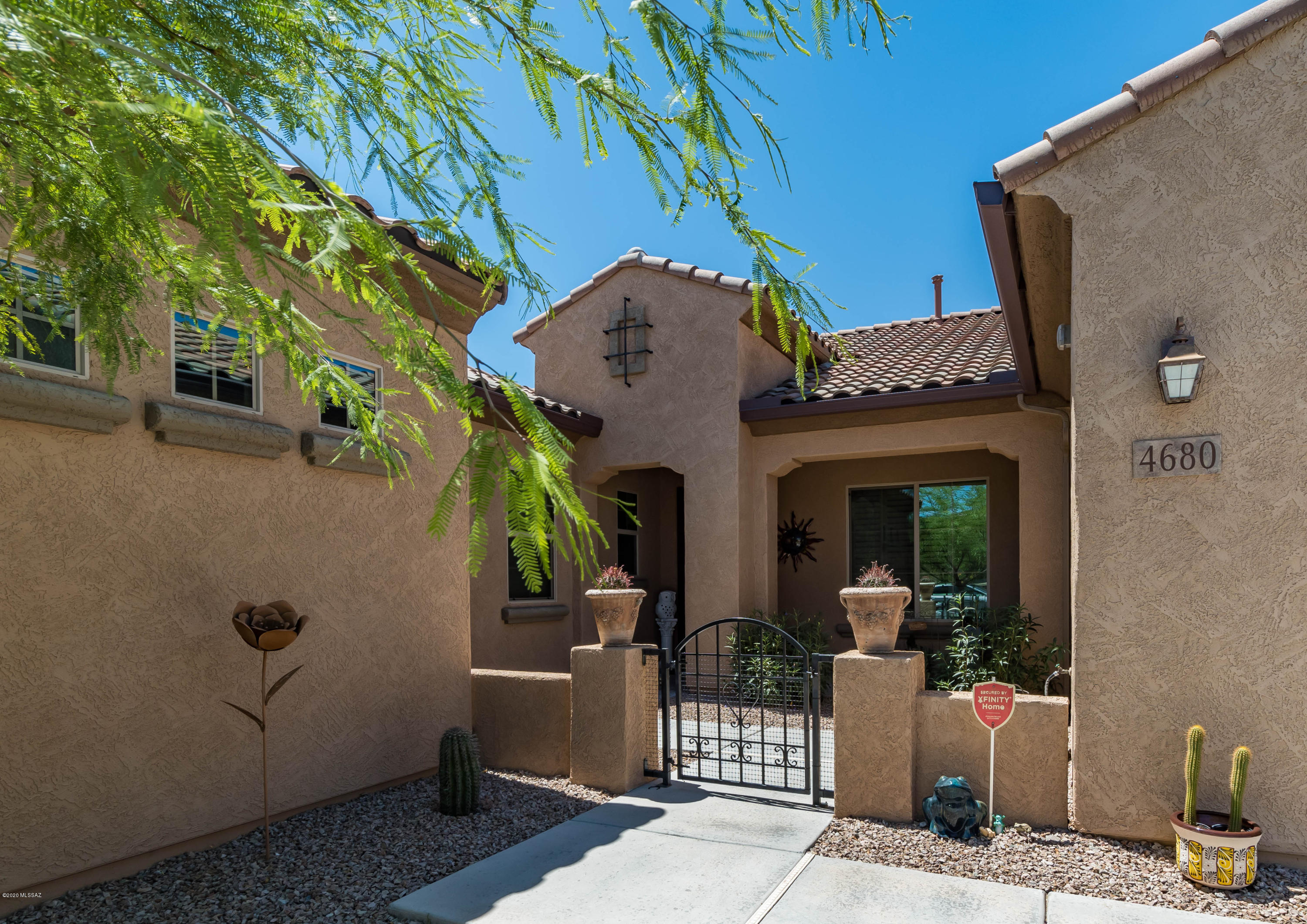 Welcome Home!  Endless opportunities with this outstanding floorplan that includes 3 Bedrooms + Den, 2 1/2 baths plus private casita with an additional Bed and Bath. This popular split bedroom, open floorplan is great for entertaining, plus offers plenty of separate spaces for privacy.  The gourmet kitchen includes cherry cabinets, granite countertops with glass backsplash, stainless appliances, gas cooktop, and a huge walk in pantry.  The extended master retreat has a seating area and luxurious bath with an oversized walk in shower.  Plantations shutters throughout!  Close by Tangerine Sky Park, Shopping, and Schools. Come explore all this fantastic location has to offer!