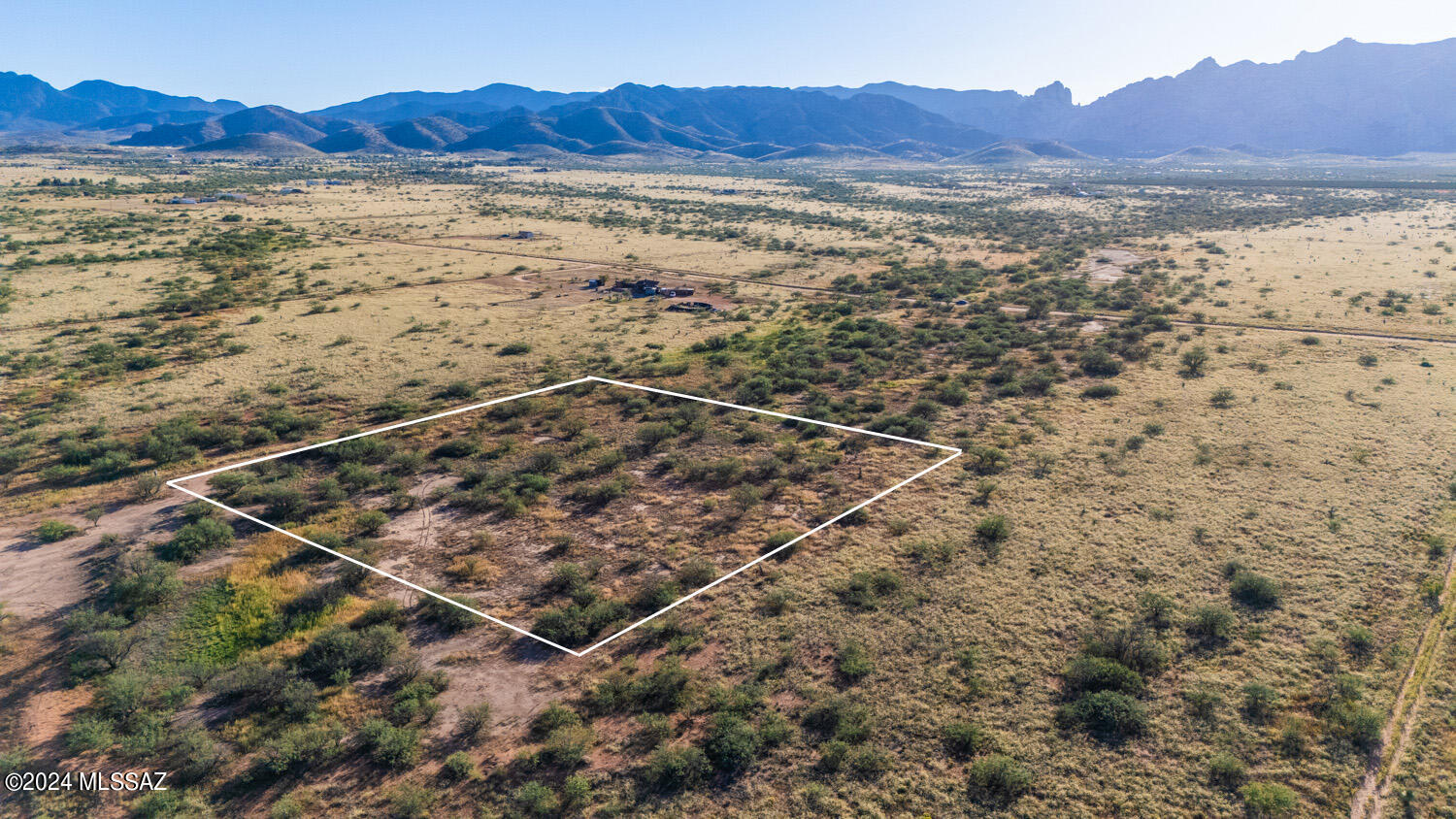 Discover 2.25 acres in Sunsites, offering both privacy and convenience. Located on a quiet dirt road, with quick access to paved Ironwood Rd, this fabulous double lot showcases stunning views of the Dragoon Mountains and Cochise Stronghold. Experience peaceful small-town living with few neighbors, perfect for stargazing under the incredible night skies. Ideal for those seeking a retirement oasis or a country retreat, this property offers the tranquility and charm of rural living while remaining close to essential amenities. A prime opportunity to create your dream escape!