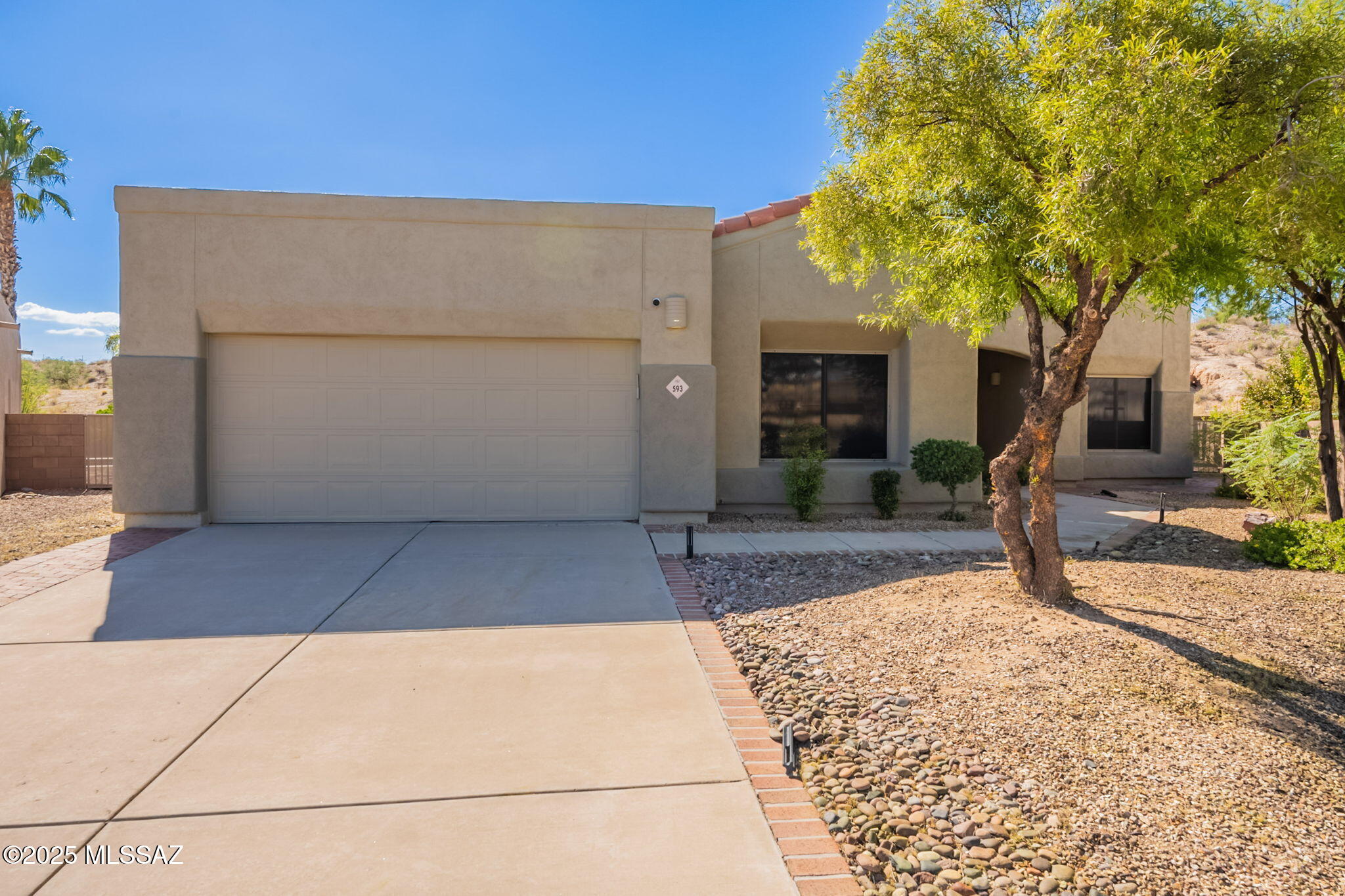 This 3 bed 2 bath + den is nestled within the Monterra subdivision and sits on a large lot within a cul-de-sac. No neighbors behind and surrounded by picturesque mountain views! With NEW interior paint and carpet, this open split floorplan features vaulted ceilings, ample natural light and offer lots of possibilities with customization. New AC 2022 and recently cleaned ducts. Kitchen features NEW appliances, kitchen island with seating and abundant cabinet space. Large master ensuite has dual vanities, separate toilet room, walk-in shower and large closet. Private and tranquil backyard with extended patio cover, heated pool spa and mature low maintenance landscaping. Prime Oro Valley location near Naranja Park includes extensive walking/hiking trails, a dog park, pickleball, playgrounds with lots of shopping and eateries nearby!