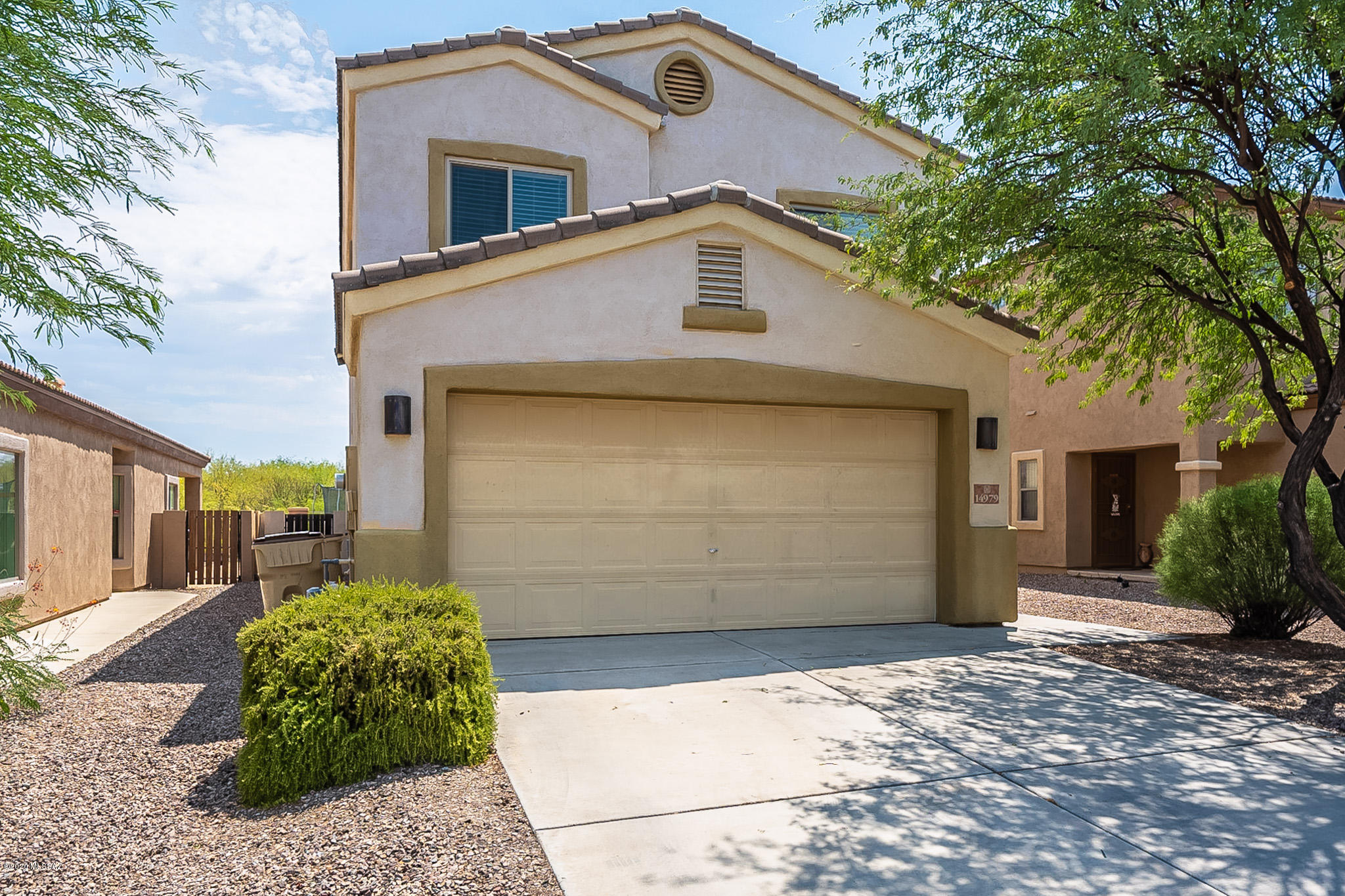 MOUNTAIN AND PECAN ORCHARD VIEWS WITH NO REAR NEIGHBORS in Master Planned Community of Rancho Sahuarita!!!
This two story home features four bedrooms, two and a half baths, downstairs den and upstairs bonus room!  Dining area plus breakfast bar and open great room concept. Maple cabinets and stainless steel appliances in kitchen. Blinds and ceiling fans throughout. Backyard see through fencing. Covered patio and kids play equipment. This home is MOVE IN READY!!! Don't Miss This One!!!!!