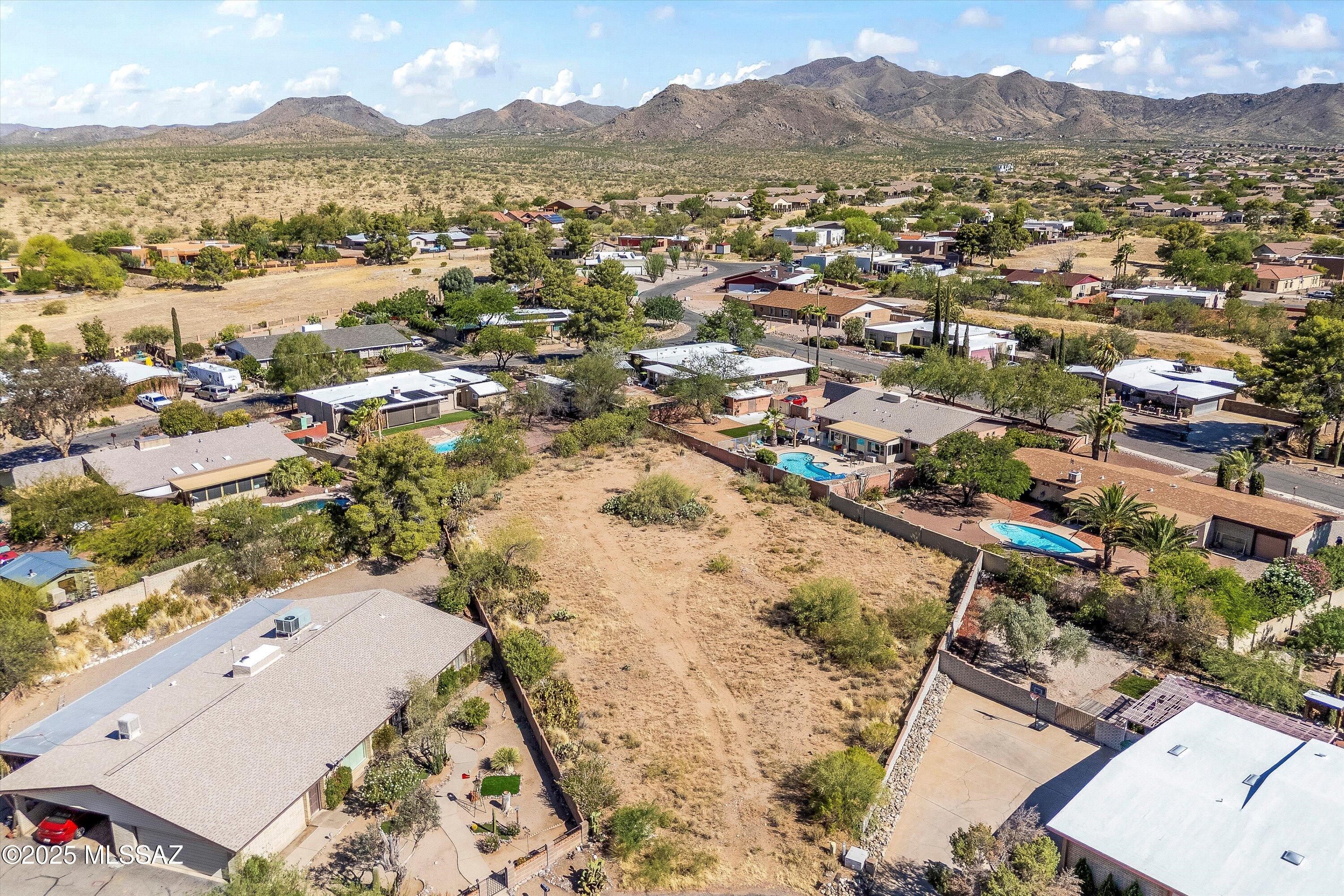 Build Your Dream in Vail - 0.5 Acre Lot in Santa Rita Bel Air Estates.
Endless possibilities await on this spacious 0.5-acre vacant lot in the desirable Santa Rita Bel Air Estates subdivision. Located on a cul-de-sac with stunning views and no HOA, this flat, buildable parcel offers the perfect opportunity to create your custom home, workshop, or investment property. Plenty of room for RV parking, a pool, or guest house-bring your vision!
Enjoy privacy, space, and freedom, all within the highly rated Vail School District. Utilities nearby and easy access to I-10, schools, and shopping. Be sure to check out MLS #22517166-an adjacent fixer-upper also available for sale-possible package deal!