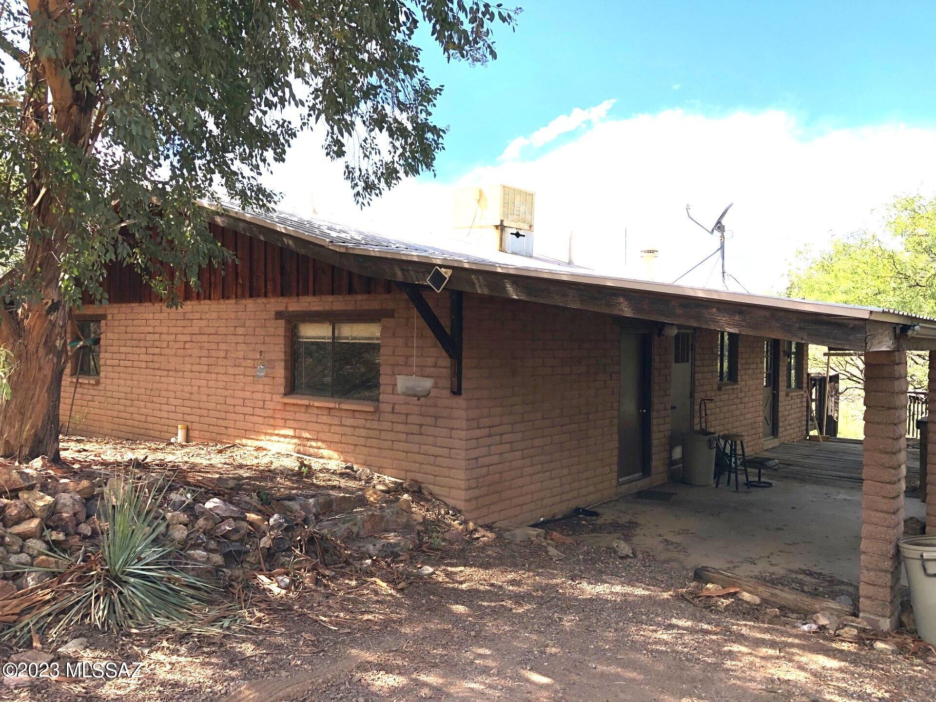 A real fixer-upper in a beautiful area!  Off Flux Canyon Road on a steep winding road, this home with an investment could be an amazing weekend, seasonal or full time home.  Right now, the home is in major need of repair and is being sold ''As-Is''.
The main part of the home is  2 bedroom/2bath with a great room with large windows to enjoy the high mountain views.  Their is a separate guest quarters downstairs with 1 bedroom and bath,  
Enjoy the gorgeous views, privacy, clean air and dark starry nights.
