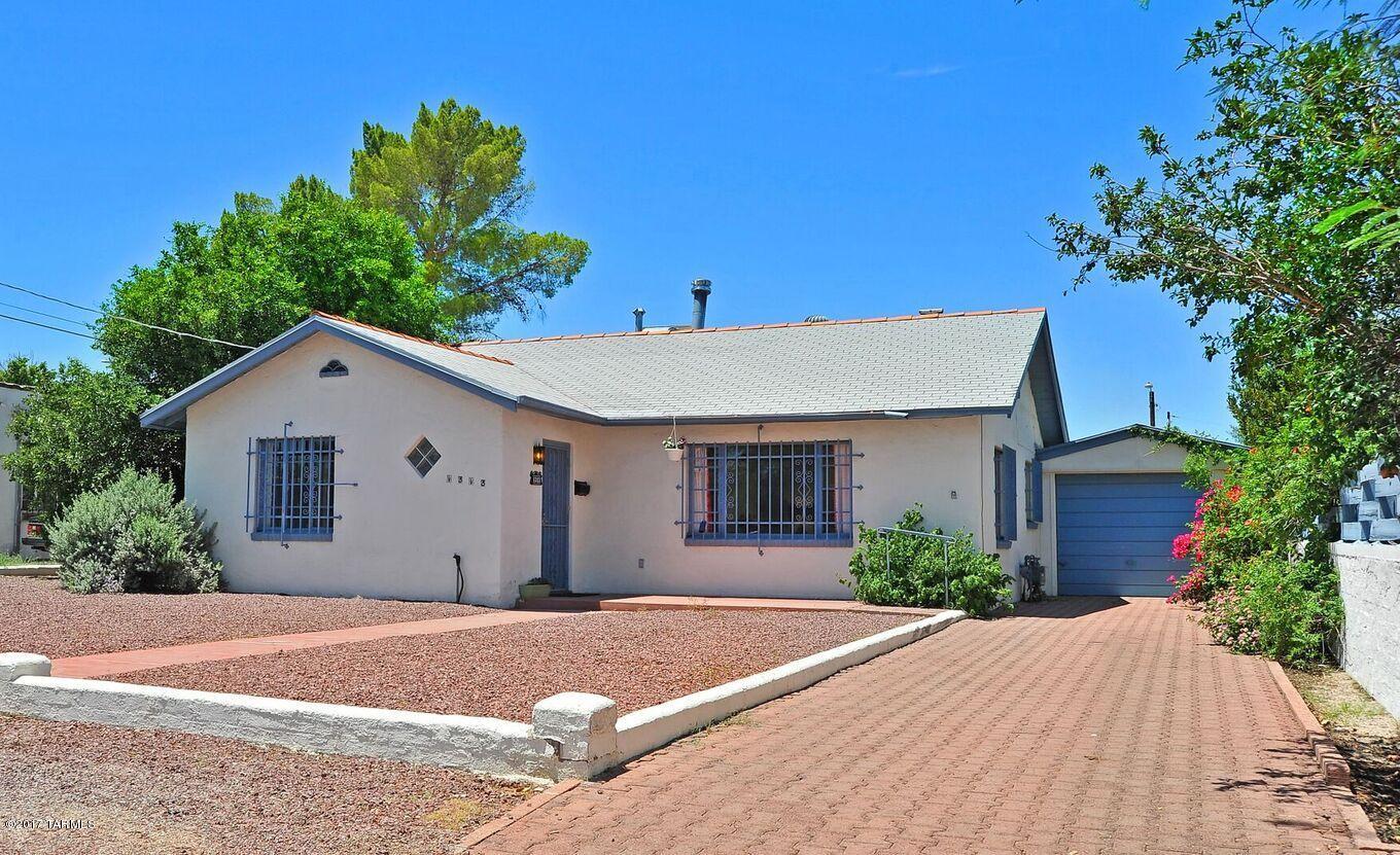 Nice curb appeal and great location is just the start!.  This little gem has lots of character including a cool wood ceiling in the living room and an artistic freestanding, wood burning stove/fireplace. The kitchen has  Corian counter tops, a double oven and a dining area.  Right off the kitchen you have even more living area with a spacious AZ Room. One of the nicest features of the house is a semi-enclosed porch  which makes a wonderful spot for entertaining friends. Outside the porch is a private back yard.  There is a brick paver area just waiting for your table, chairs and  sun umbrella.  The pool was recently re-plastered, a new pump and has solar heating!  And this house  has a one car garage with tons of storage-something you don’t often find in the area!  Check out this charmer