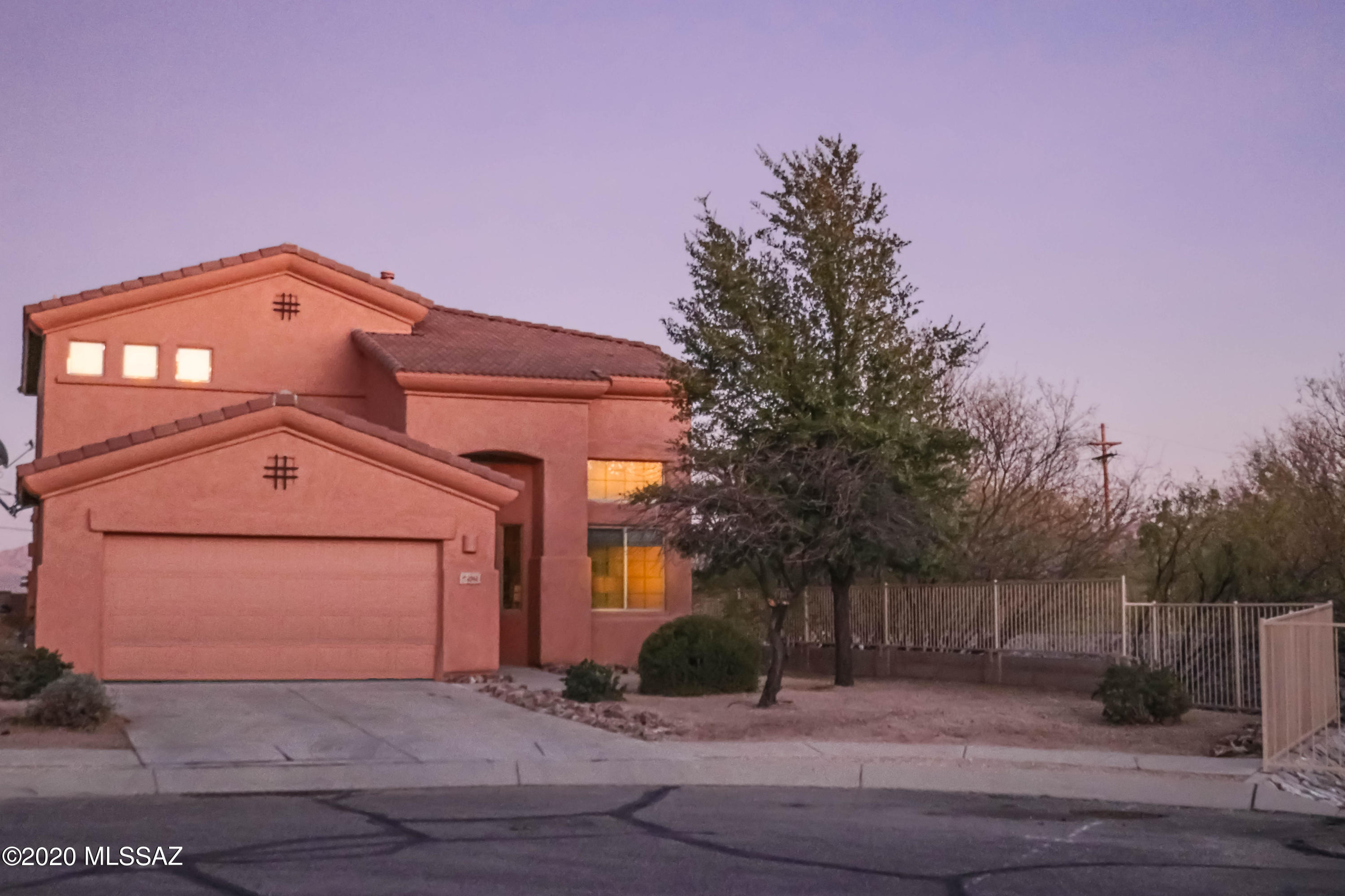 Look no more... This beautiful home has it all! Enjoy amazing panoramic mountain views from the master bedroom balcony. This 4 bedroom home backs up to State Land and is situated on a cul-de-sac. in front of the community park and pool. No age restriction in Green Valley. Downstairs has tile throughout. The kitchen features granite, stainless steel appliances and 42inch cabinets. A place  to cozy up in front of the fireplace. Come check it out!!
