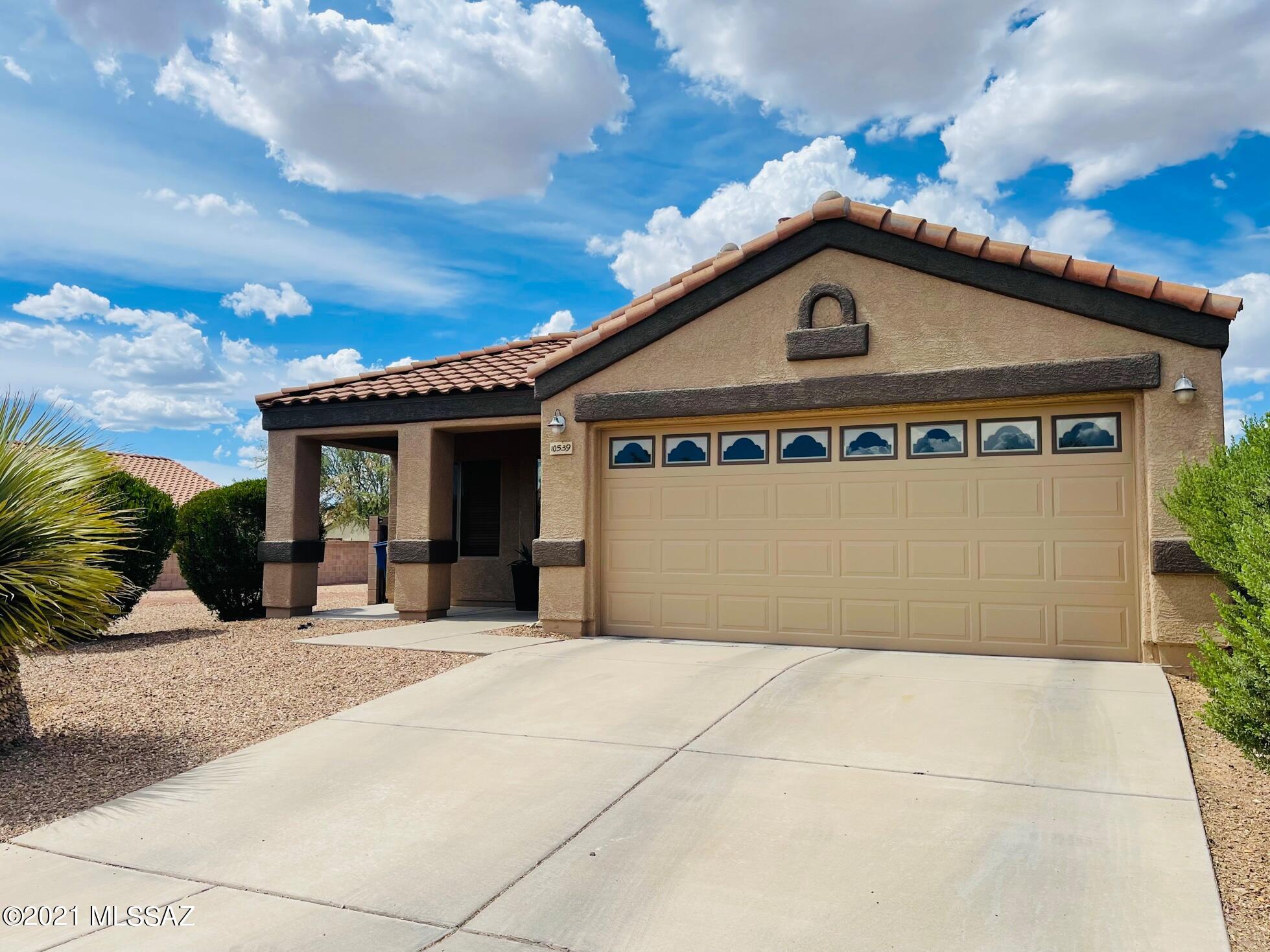 Perfectly located 4 bedroom 2 full bathroom home! Tile entry leads you to the formal living and dining area.  Kitchen has breakfast bar, tall cabinets and spacious pantry closet. Open living space leads to the back yard, perfect for entertaining.  Master bathroom has dual vanities and garden tub with shower.  Hall bathroom is a Jack n Jill conveniently located in the hallway between two guest rooms.  Plenty of bedrooms for the whole family!  Back yard landscaping is complete with turf, mature trees, and decorative gravel. Playground and picnic area is across the street.  Home is next to a common area on the west side. Shopping is minutes away and home is located in the top rated Vail School District.  This home will go fast!