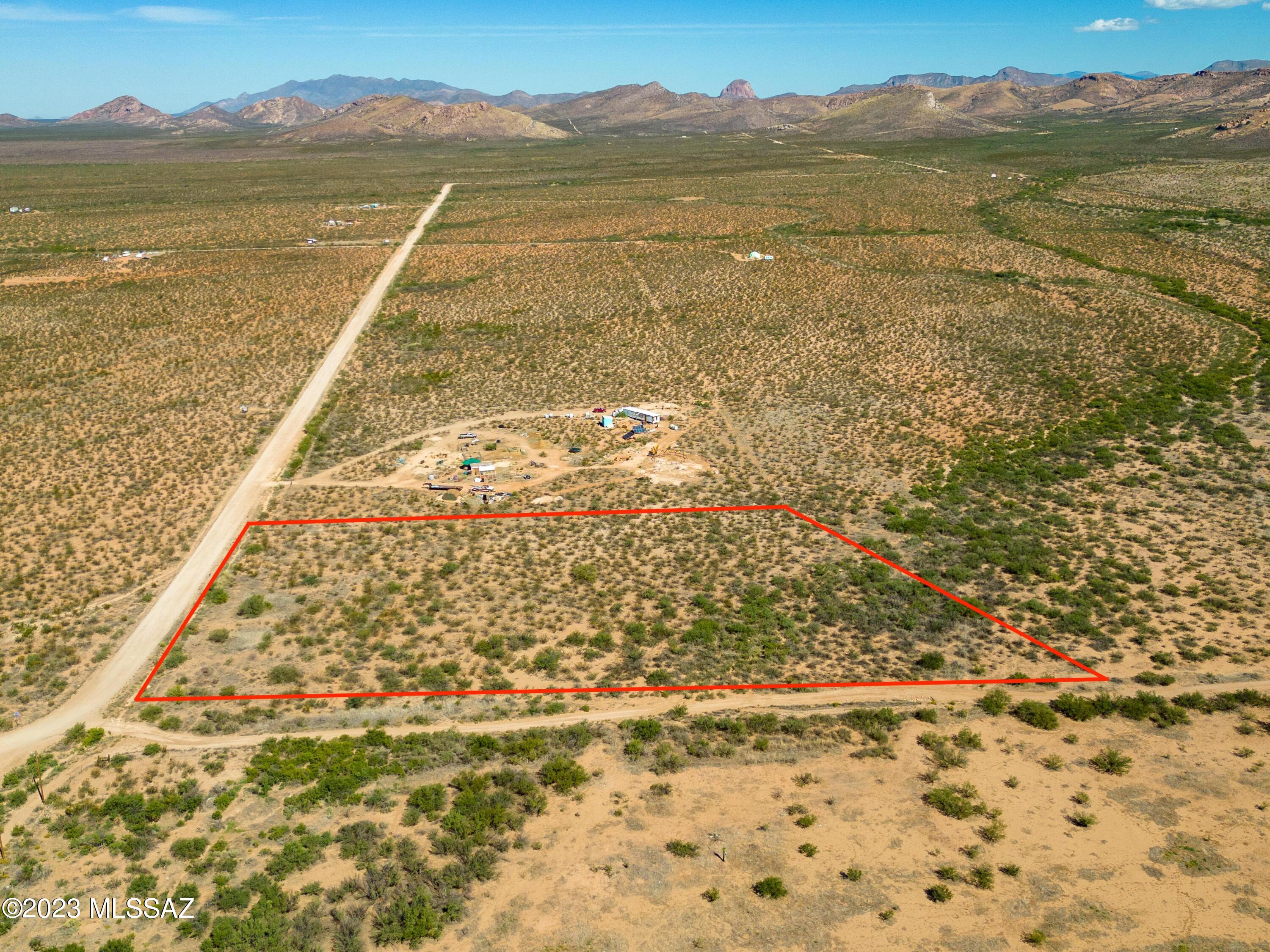 Great flat buildable lot, the perfect spot for your off-grid desert getaway or your forever home. Incredible views. With 5.1 acres you will have room for your horses to play. Seller will carry with $2900 down. Don't let this get away.