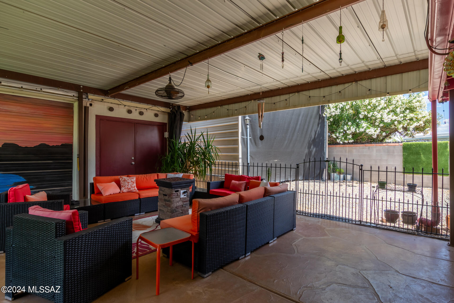 For those searching for a home with RV parking, huge workshop, No HOA, covered Outdoor Living space with ceiling fan; watch TV while relaxing in your very own Bullfrog Spa with JetPak Therapy System; Dry storage unit; Workshop with portable evap cooler,  fridge, freezer, utility sink with hot-water system; Huge versatile storage space with portable a/c could be used as hobby room, personal gym, game room,... with lots of shelves; Electrically powered double-sided gates leads to a covered RV parking with 50amp perfect for storing your RV, Boat, Big Toys; Covered fenced-in dog-run, Above ground pool with Solar heater; Green house; Citrus trees, artificial turf for low care; Bedrooms freshly painted;  Near elementary School, Grocery stores, Eateries, Medical facilities; Interstate I-10