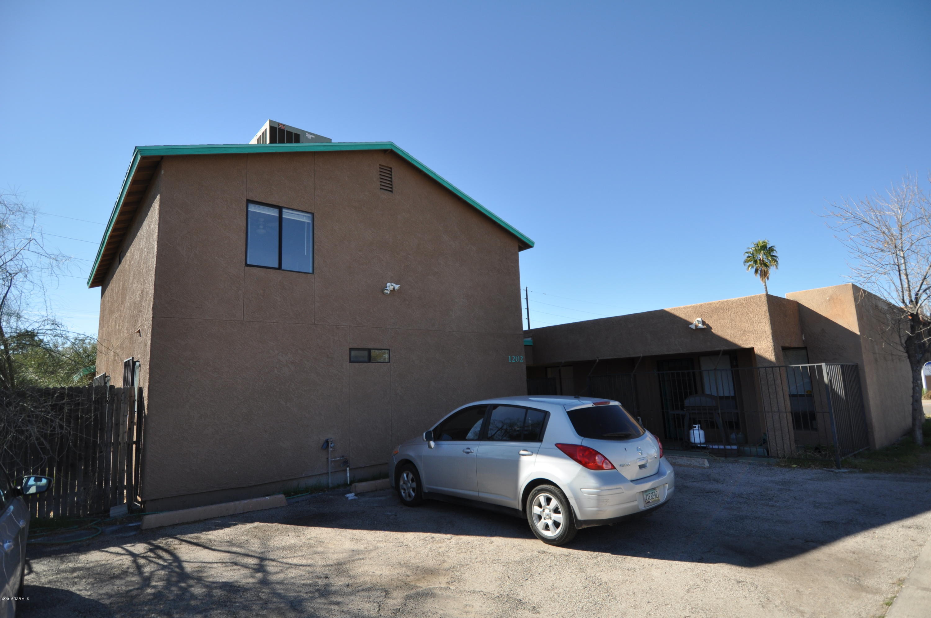 Outstanding Location! 2 Homes. West Unit has 4 Bedrooms. East Unit has 5 Bedrooms & is avail to show. Corner Lot in the heart of North University! A few blocks to main campus, UofA Medical Center & Modern Street Car! Original building constructed circa 1950. Significant reconstruction/ modernization in 1995. Tenants love the roof deck & private gated or fenced patios. Generously sized bedrooms! Extensive ceramic tile. Fully equipped with a laundry room for each building. Appliances included as-is. Do not disturb tenants.