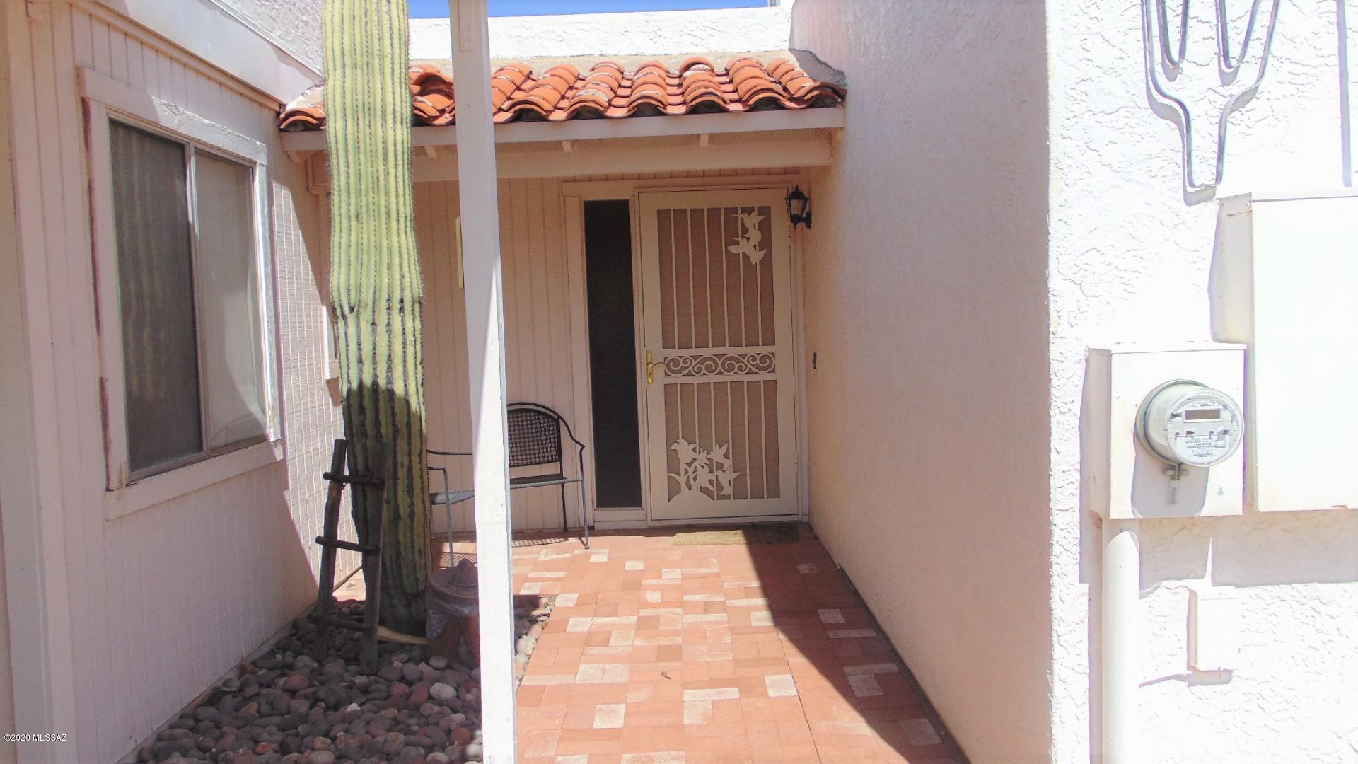 2 bedroom, 2 bathroom townhouse in Casa Paloma II with an AZ room, a carport space, storage in back, backs up to common area, has a peak of mountain views, and can be furnished, unfurnished, or partially furnished... your choice! Green Valley Rec is available if the tenant(s) want it. Available LONG-TERM on an ANNUAL LEASE. This is a 55 and up community.