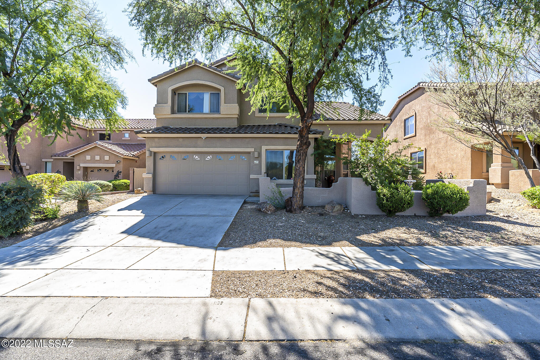 Spectacular living in this well kept updated property featuring mountain views from spacious & flexible floorplan as well as just minutes to shopping, restaurants and much more! Pleasant  space offers the best for any size family! Discover the outdoor living as well as the indoors! Raised flagstone patio & water feature is perfect for entertaining near pebble tech pool built in 2011. Former model of DR Horton home offers outstanding living & views in desirable Northwest! Convenient to shopping, schools, and  located just steps from Tucson/Oro Valley popular biking path.