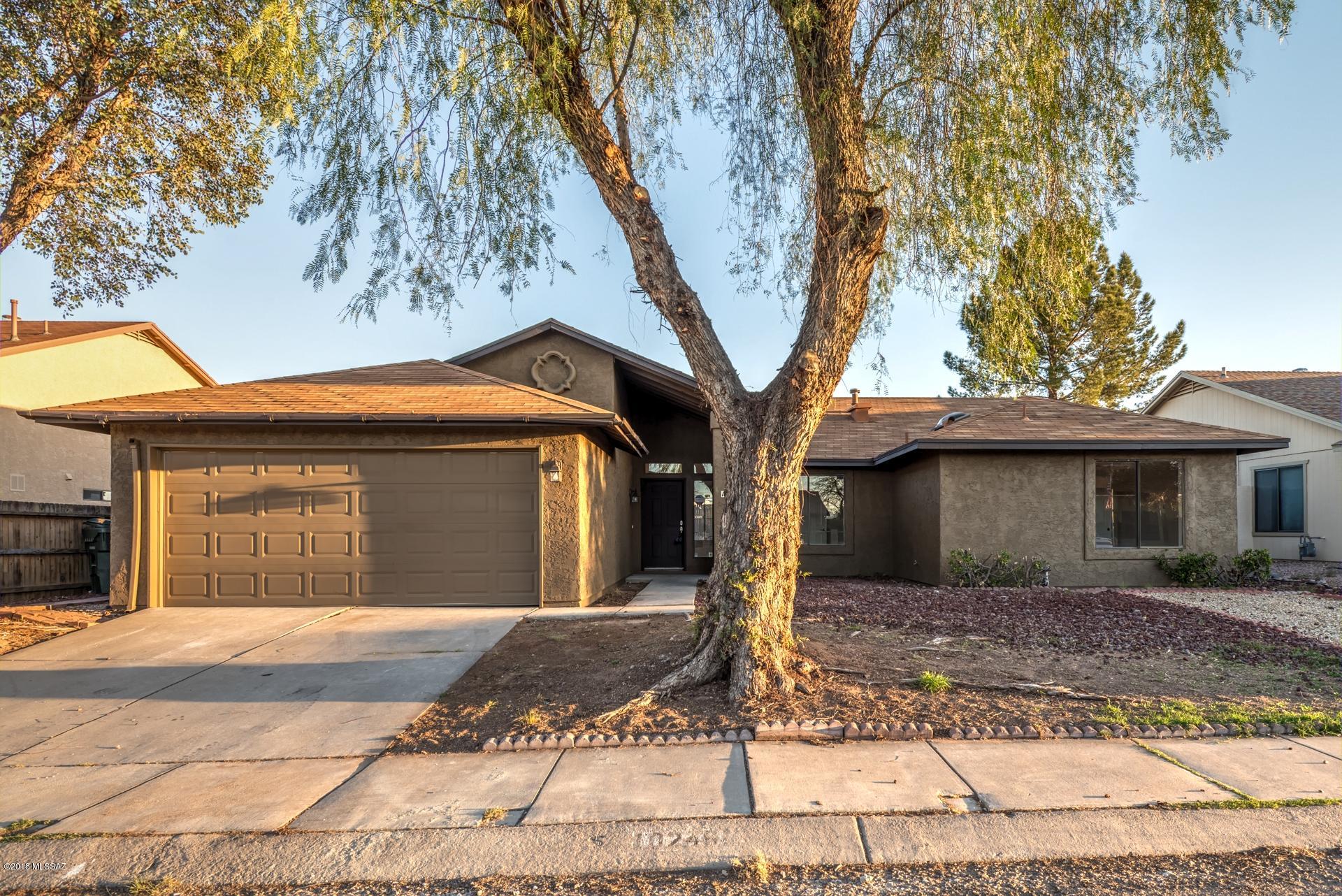 Beautiful remodel you don't want to miss!  This home features all new paint (interior and exterior), all new flooring (wood plank tile and carpet), new backsplash and new stainless steel appliances in kitchen, all new cabinets (kitchen and baths), new granite countertops (kitchen and baths), new custom tile in master shower, all new fixtures, and new doors.  A must see!