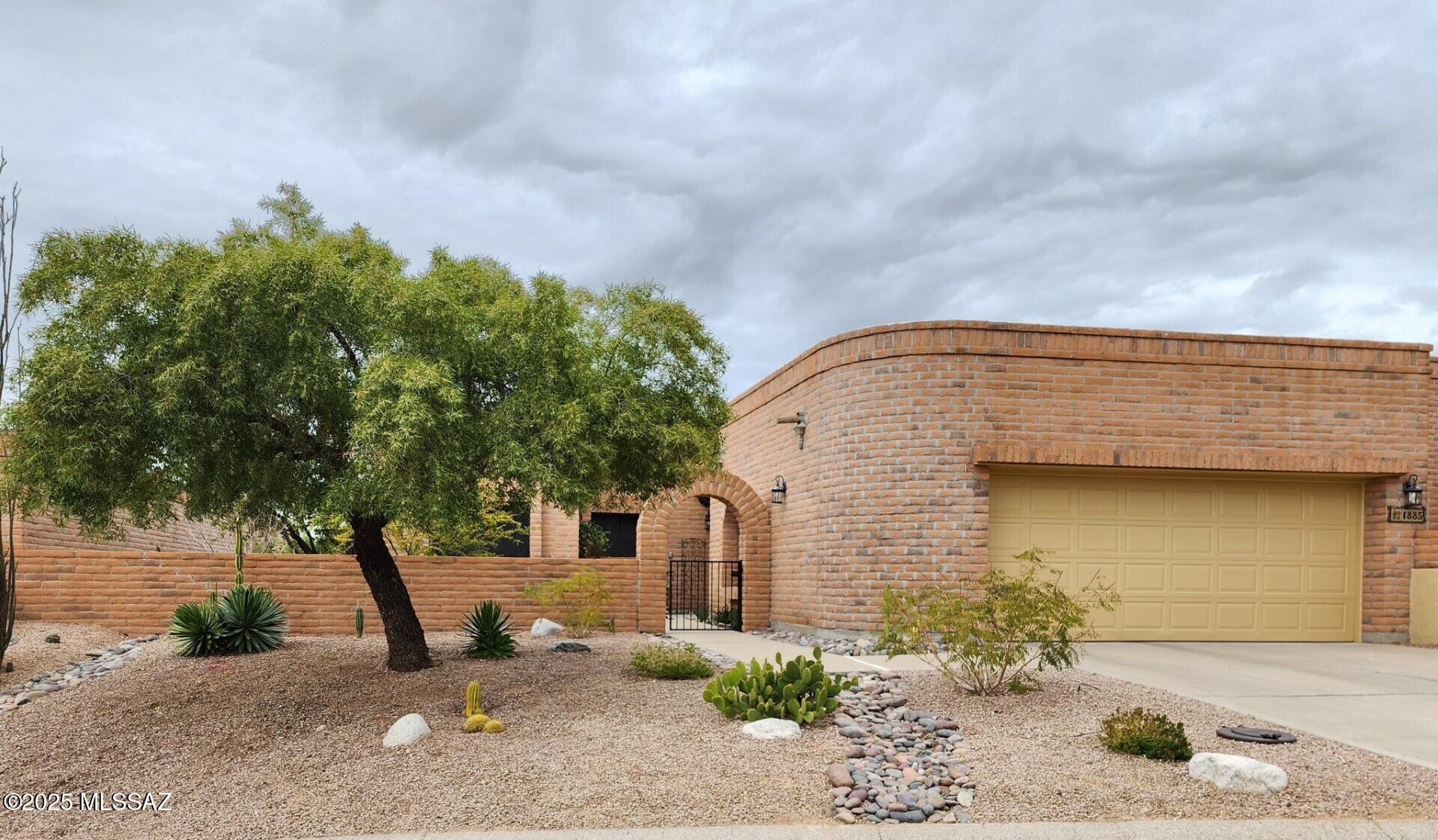 Wonderful opportunity to live in the highly sought after community of Fairfield La Cholla Hills. This 2 bedroom, 2 bath townhome (1684 SqFt) is ideally situated on an elevated lot that takes full advantage of the mountain view and open space behind. Gorgeous tile flooring throughout with lots of natural light & wonderfully spacious indoor & outdoor spaces to include an enclosed patio area perfect for office, workshop or studio. The remodeled kitchen is light & bright with granite counter tops & newer stainless appliances. High efficiency HVAC system 2022, exterior paint 2025 as well as many other improvements. The clubhouse offers its residents 2 pools, spa, billiard room, exercise room, media room, library, full kitchen plus many other amenities & activities. Don't miss this one!