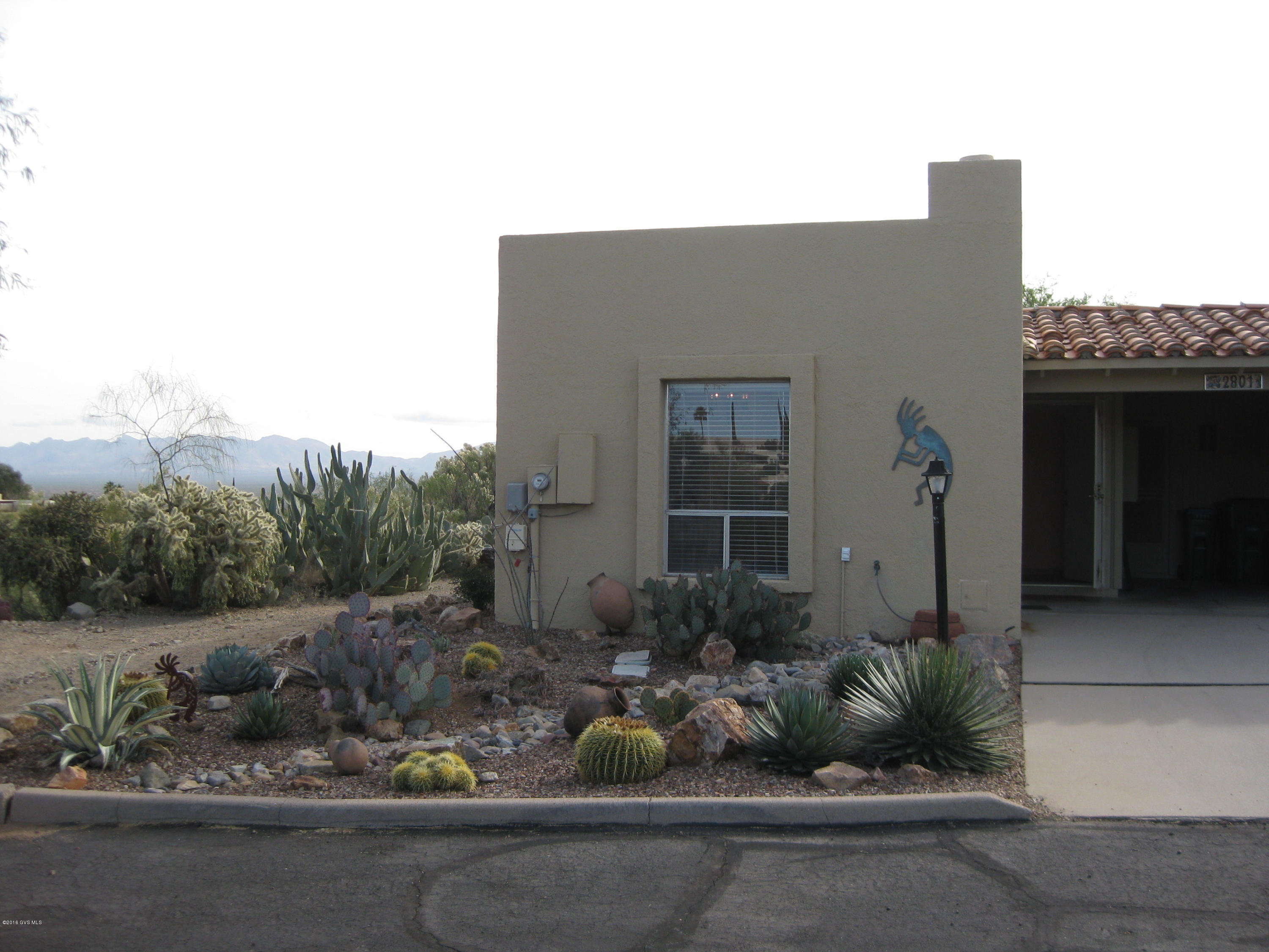 BEAUTIFUL MOUNTAIN VIEWS FROM BACK PATIO, LOVELY END UNIT TOWNHOUSE WITH TILE FLOORS, BEEHIVE FIREPLACE, EXPANDED LAUNDRY ROOM,FRONT YARD PROFESSIONALLY LANDSCAPED, REVERSE OSMOSIS,MURPHY BED, DINING TABLE WITH 4 CHAIRS, BAR STOOLS, SUN SHADE ON BACK PATIO, TERMITE WARRANTY & ROOF RE-COATED NOVEMBER 2016