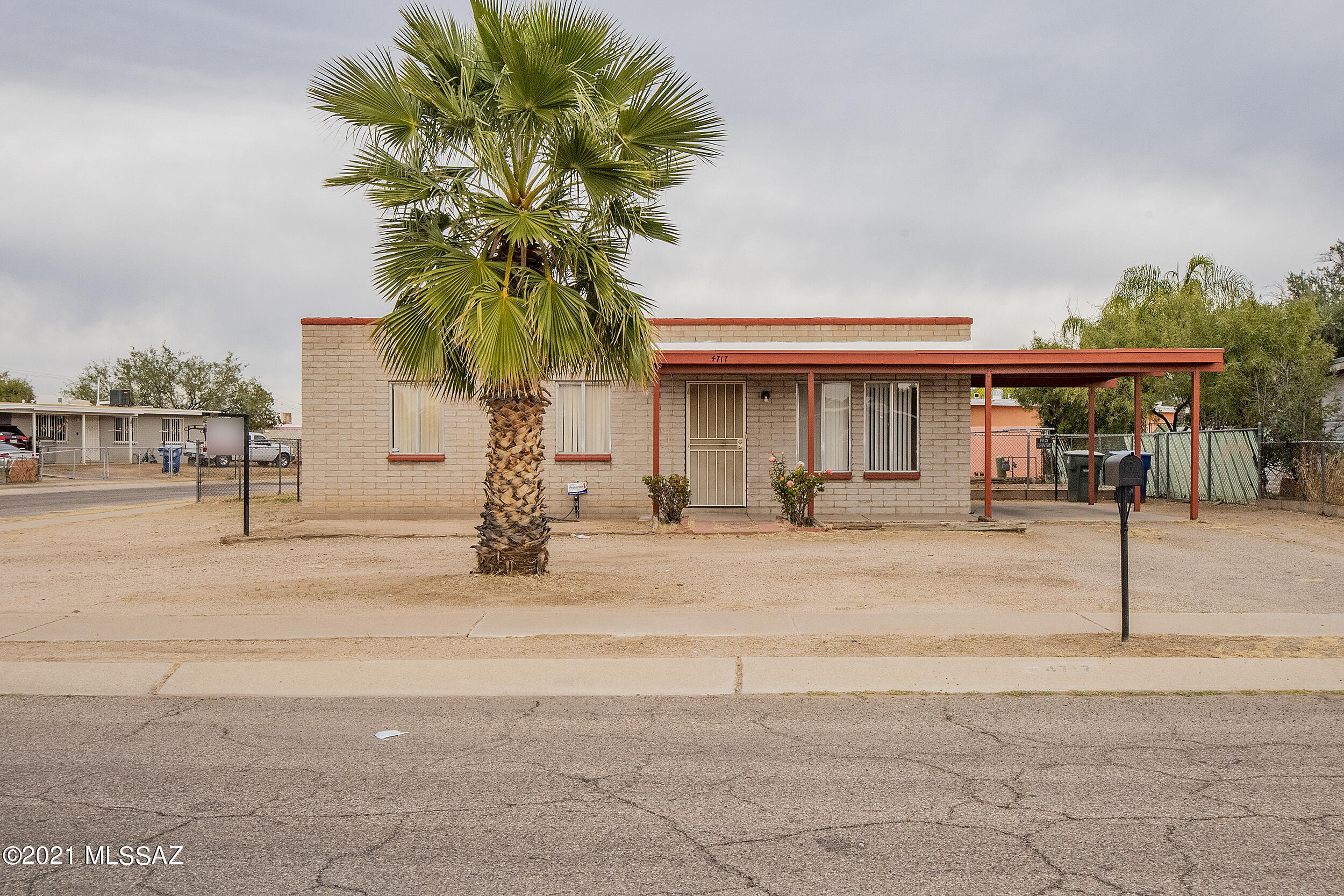 Awesome opportunity to own a slump bock home in the heart of South Tucson.  Property is perfect for a 1st time home buyer or for the savvy investor.  Property features a great room off kitchen floorplan with updated kitchen cabinets and granite countertops.  Three good size bedrooms and two fully functional bathrooms.  Property is located on a corner lot with no Homeowner Association.  Plenty of lot space for your preference in the front yard and side gate access into your back yard.  Property is priced to sell; Property will not last long!