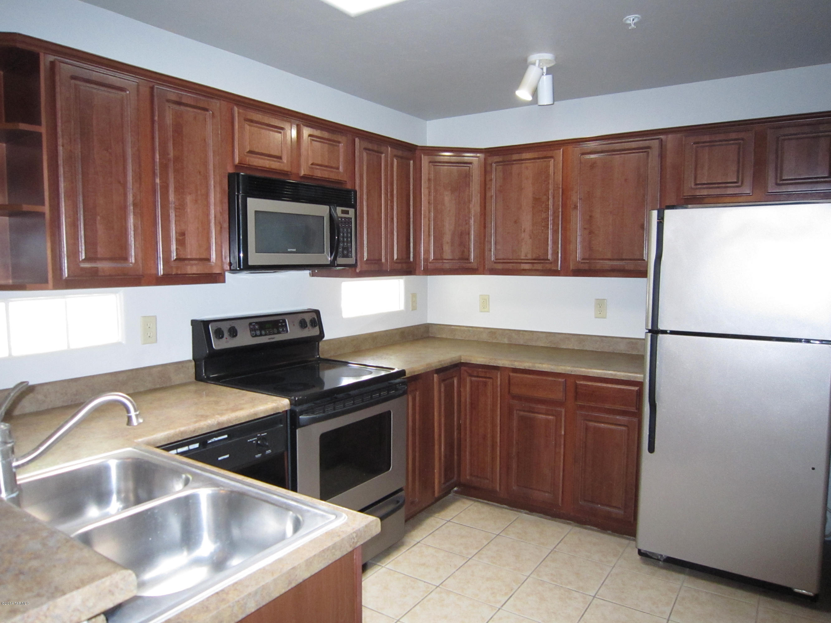 Beautiful 2 Bedroom, 2 Bath Split Plan features high ceilings, Central Air Conditioning, Stainless Steel Appliances, Stackable Washer/Dryer, private patio, dual paned windows, fire sprinkler system, covered parking - all in one great location near shopping, bus lines and walking path. Call today, this will go quickly! Built in 2007