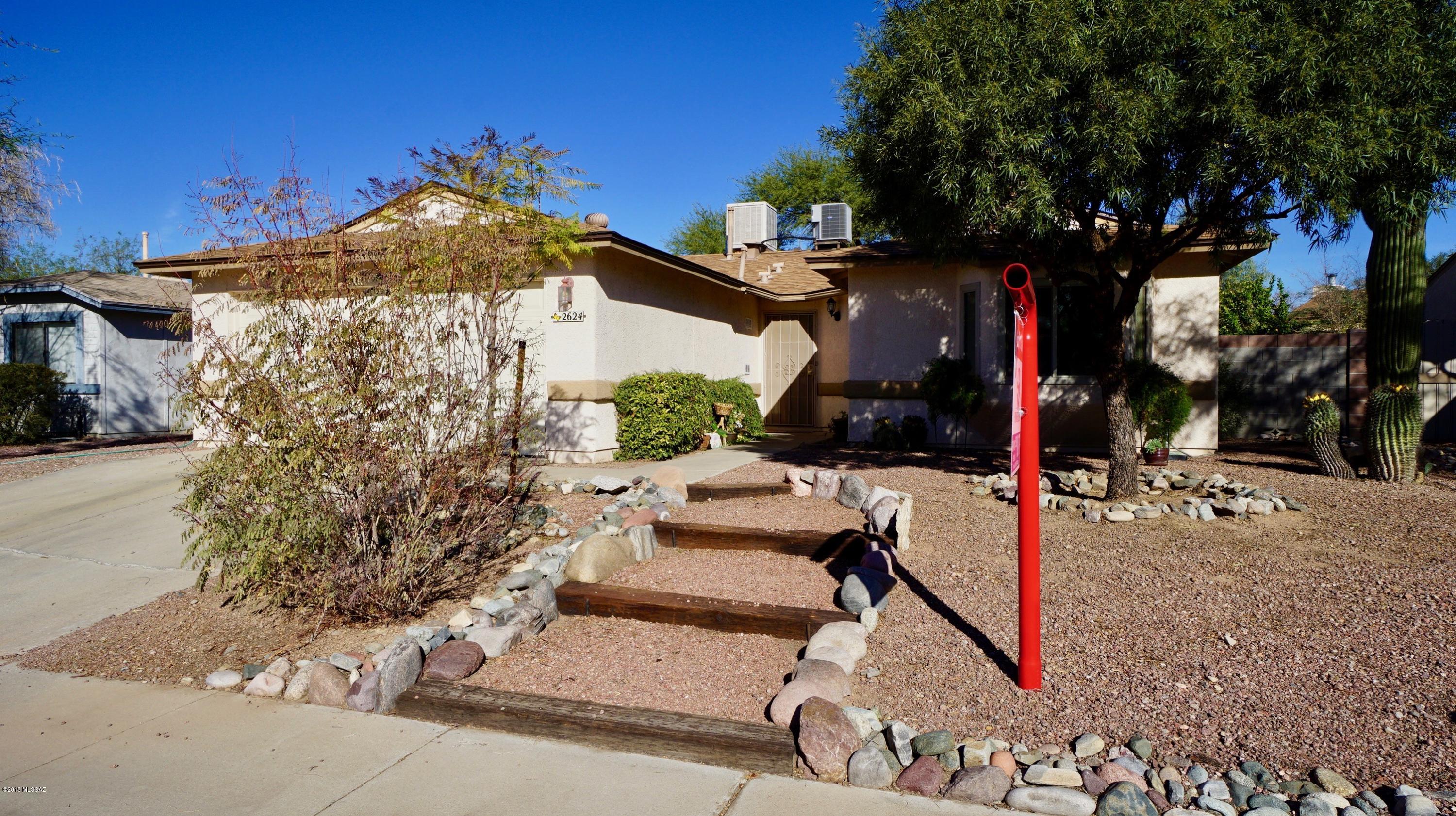 Wonderful 3BD/2BA contemporary home in NW. Open floorplan, ceiling fans throughout. Bay window in dining area.  Screened porch in back, enclosed backyard offers privacy. 2 car garage has a surround sound system in it! Community pool & spa. Convenient to shopping, schools, park & transportation. Don't miss out, this one will go fast!